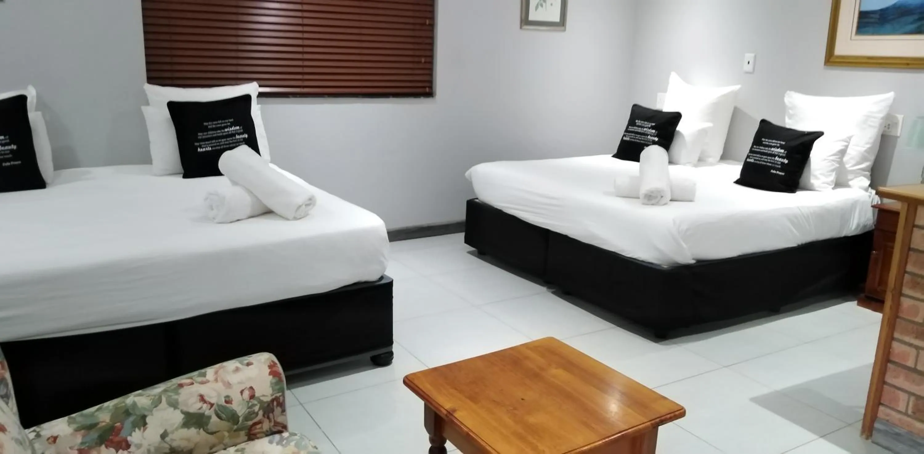 Bed in Heroes Garden Lodge