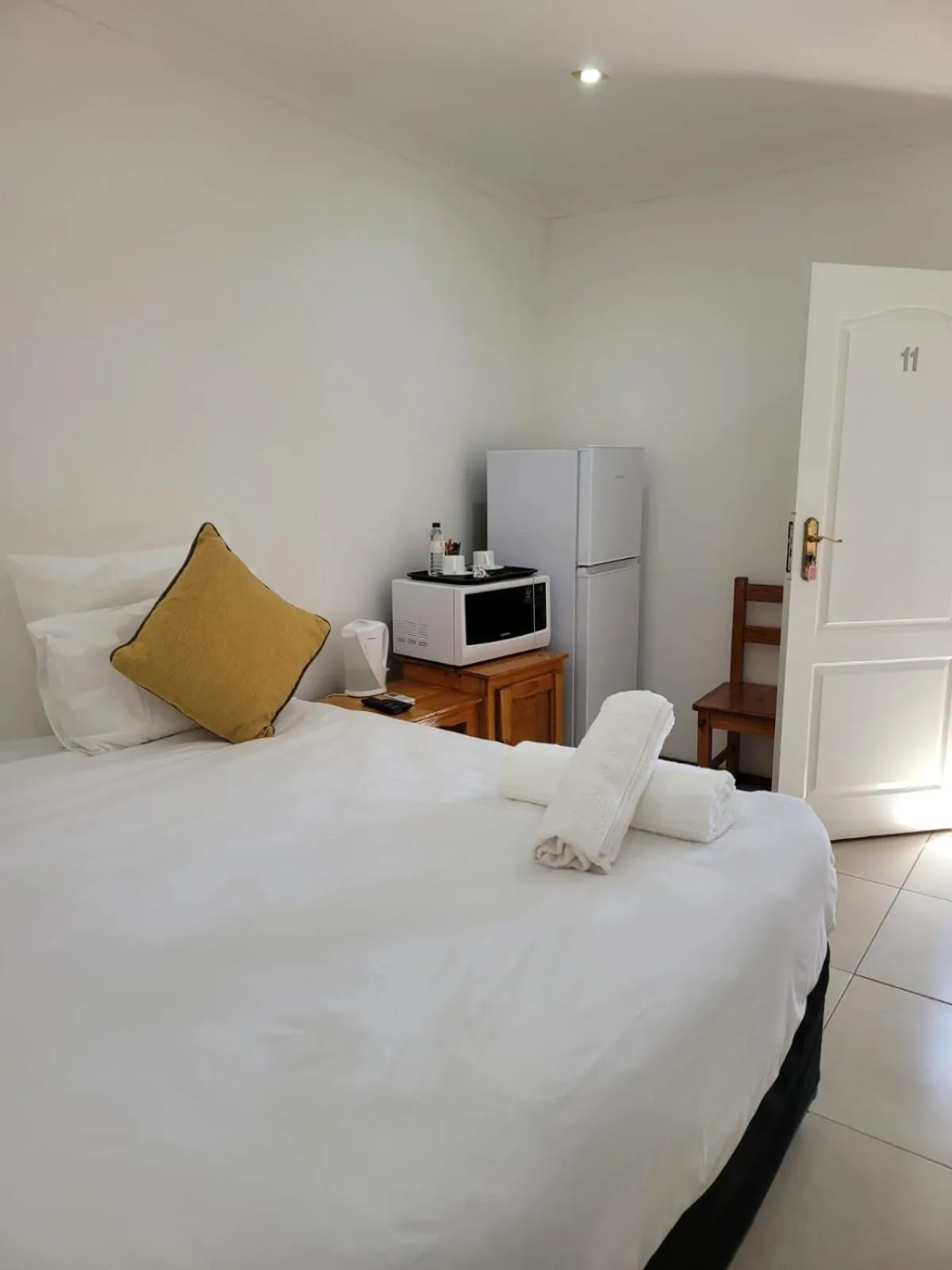 Bed in Heroes Garden Lodge