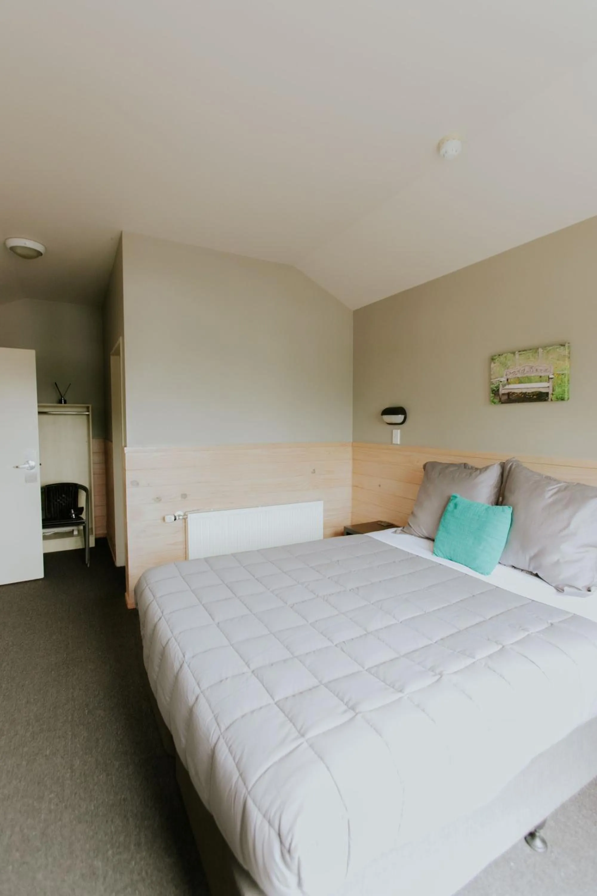 Bed in Waitomo Village Chalets home of Kiwipaka