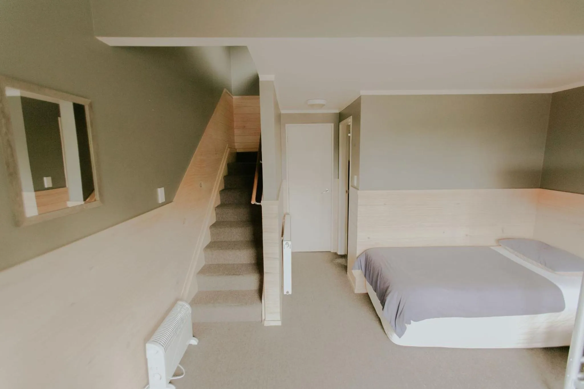 Bed in Waitomo Village Chalets home of Kiwipaka