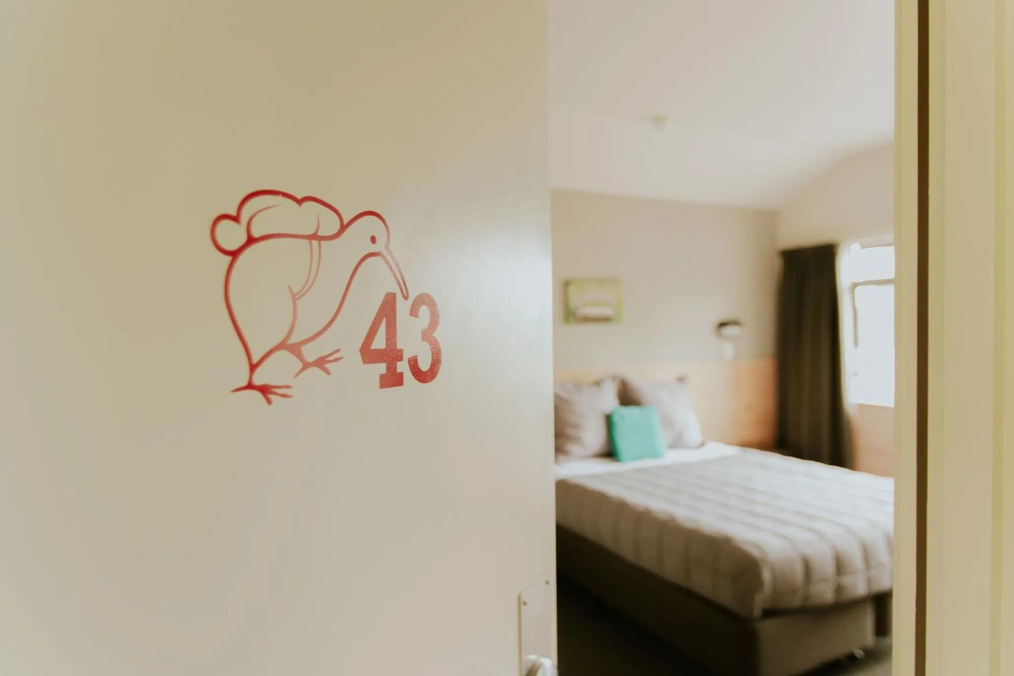 Photo of the whole room, Bed in Waitomo Village Chalets home of Kiwipaka