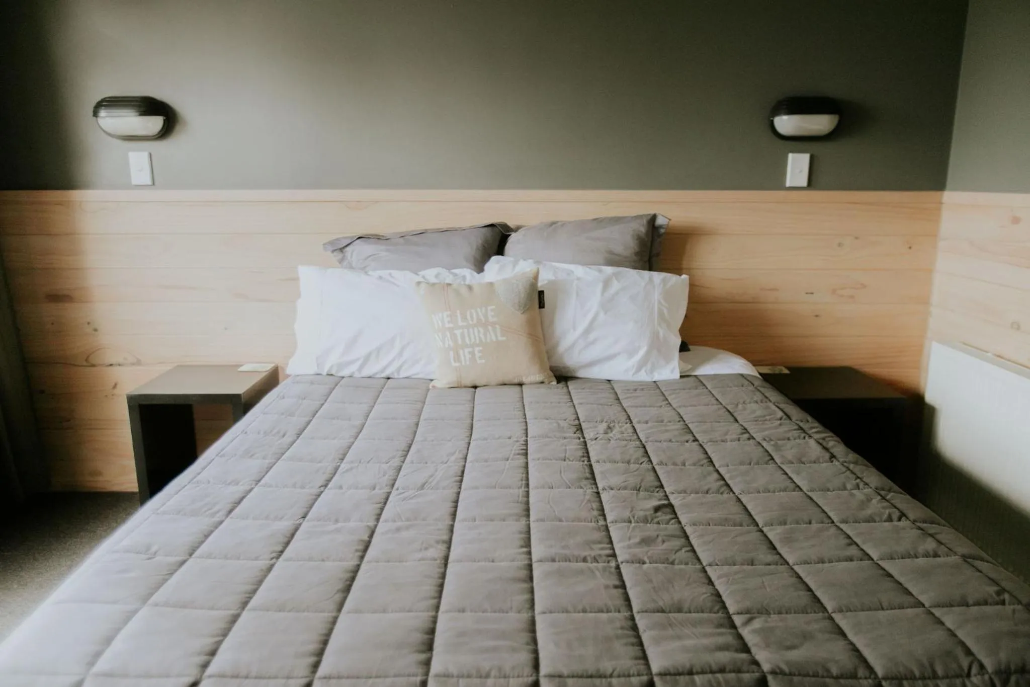Bed in Waitomo Village Chalets home of Kiwipaka