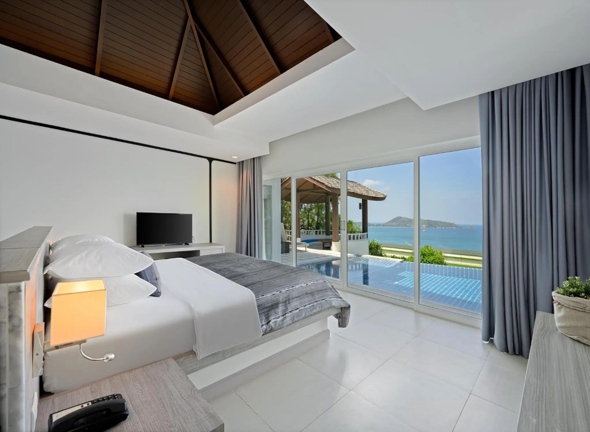 Bed in Andamantra Resort and Villa Phuket