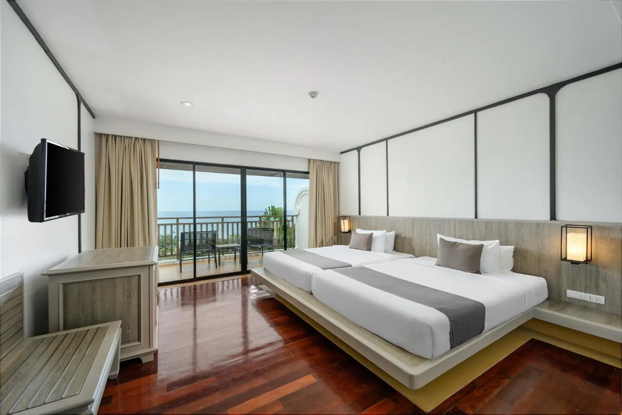 Bed in Andamantra Resort and Villa Phuket Bed in Andamantra Resort and Villa Phuket