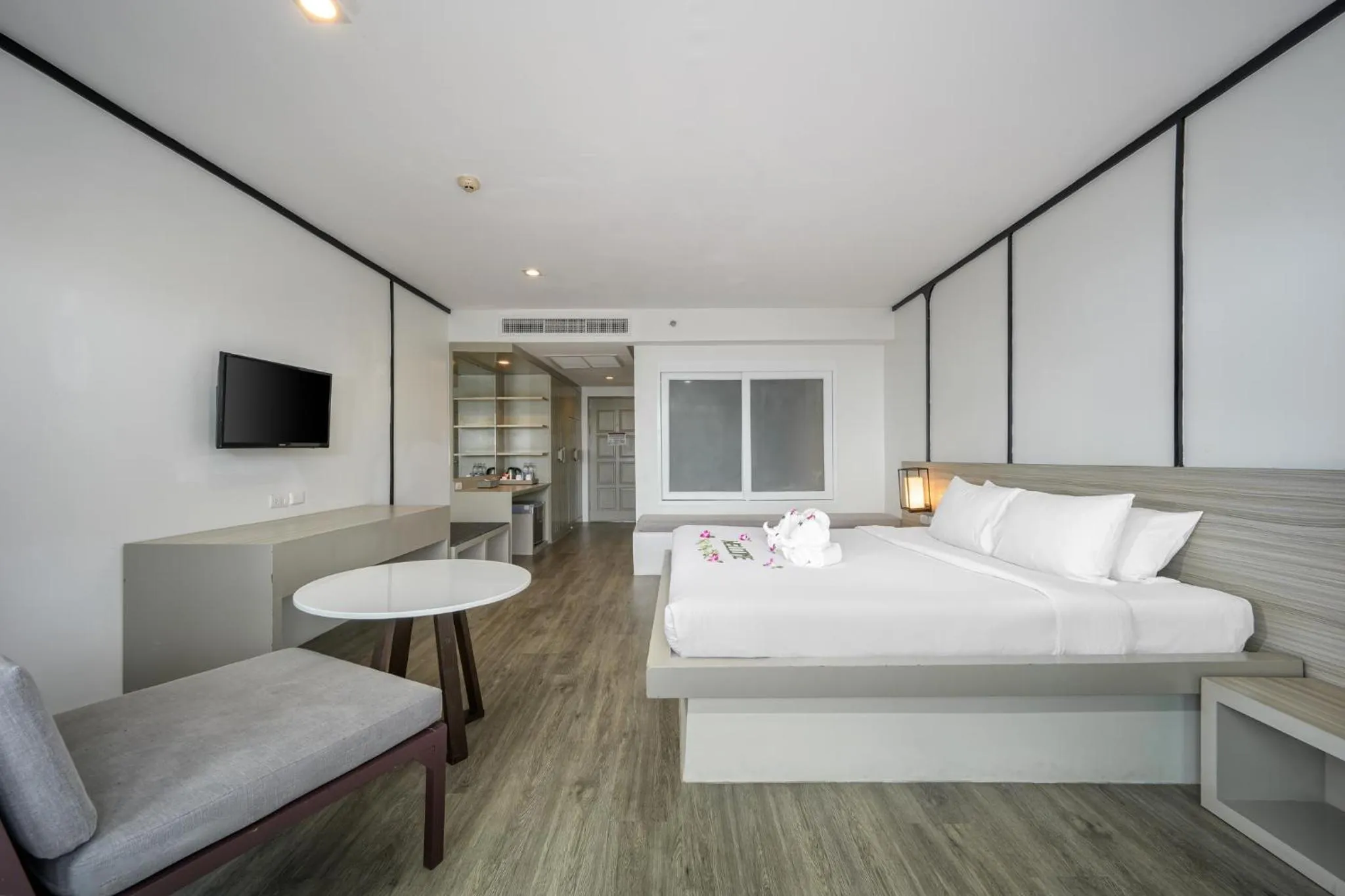 Bed in Andamantra Resort and Villa Phuket