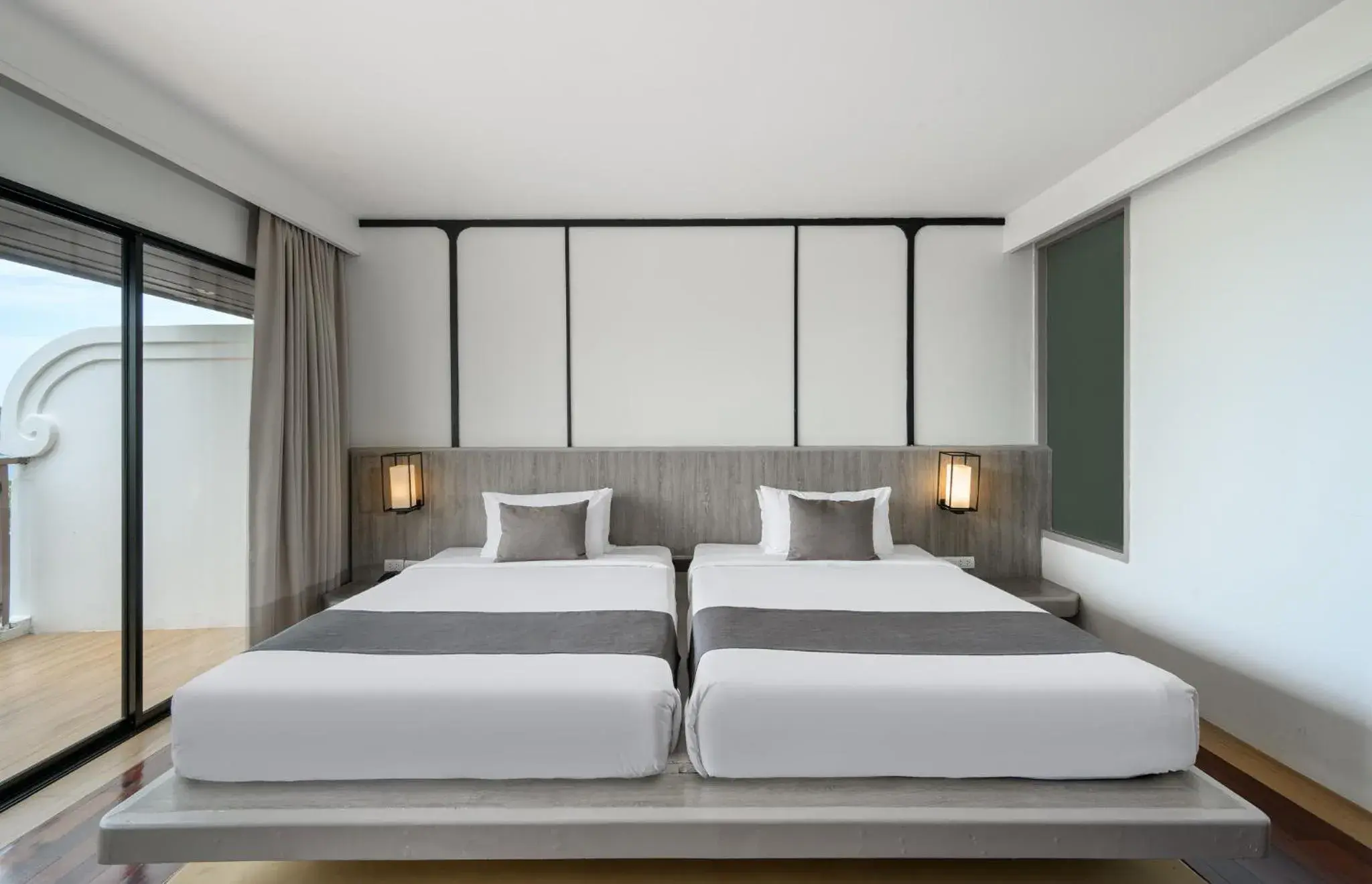 Bed in Andamantra Resort and Villa Phuket Bed in Andamantra Resort and Villa Phuket