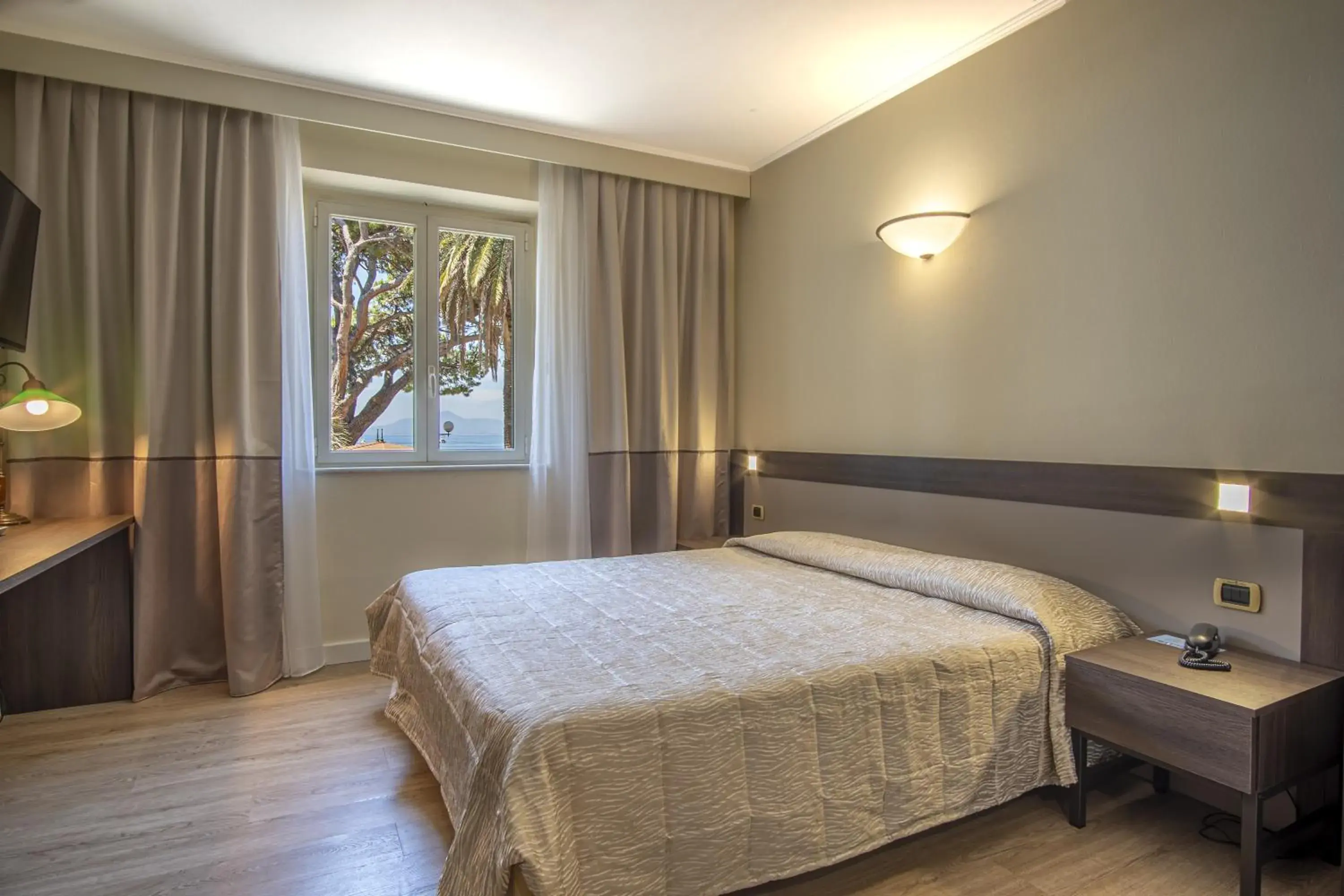 Bed in Grande Albergo Bed in Grande Albergo