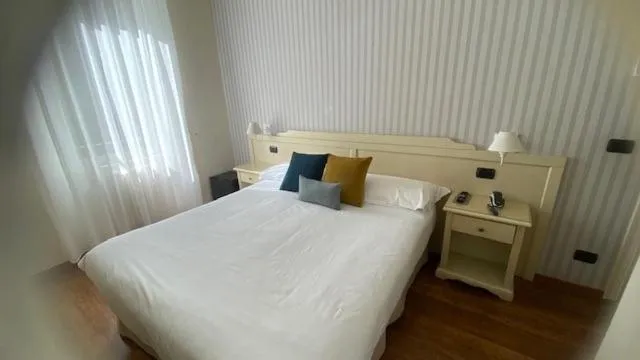 Bed in Hotel Villa Aurora