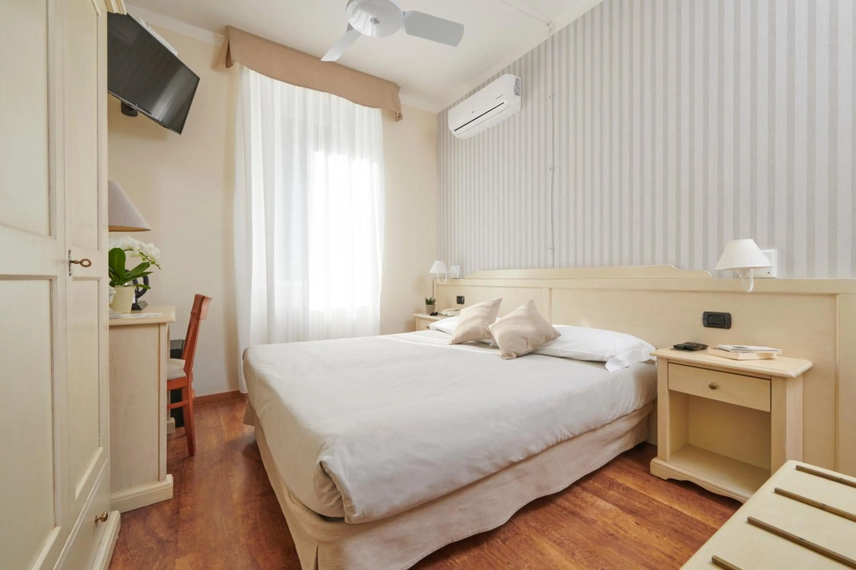 Bed in Hotel Villa Aurora