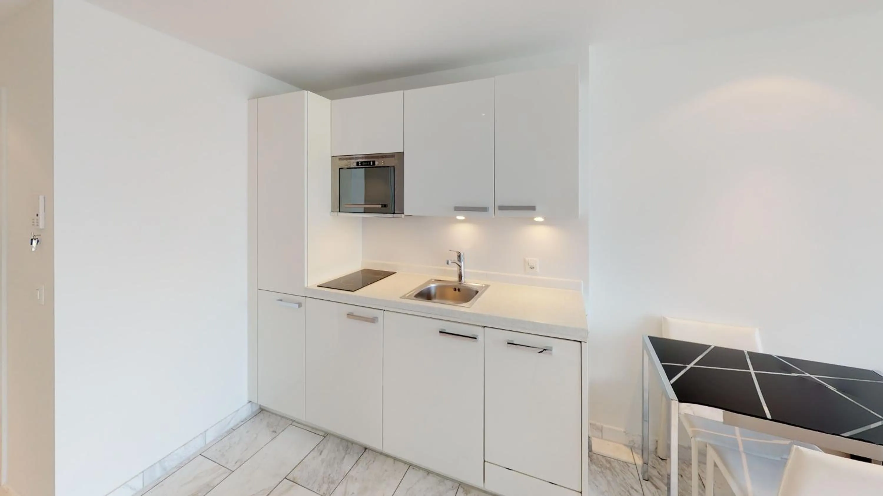 Kitchen or kitchenette in VISIONAPARTMENTS Binzmühlestrasse 46 - contactless check-in