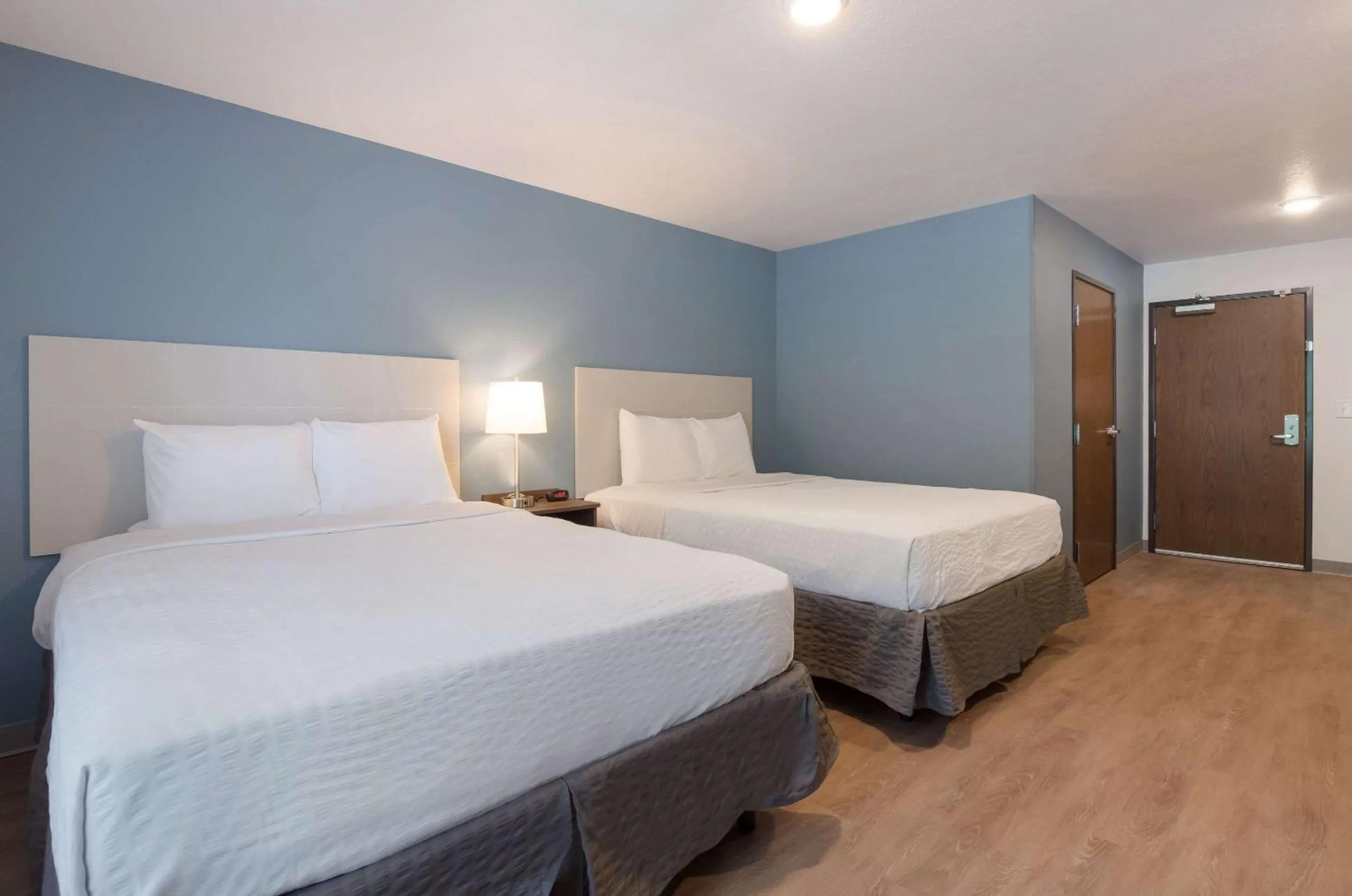 Bedroom, Bed in WoodSpring Suites Lynchburg VA