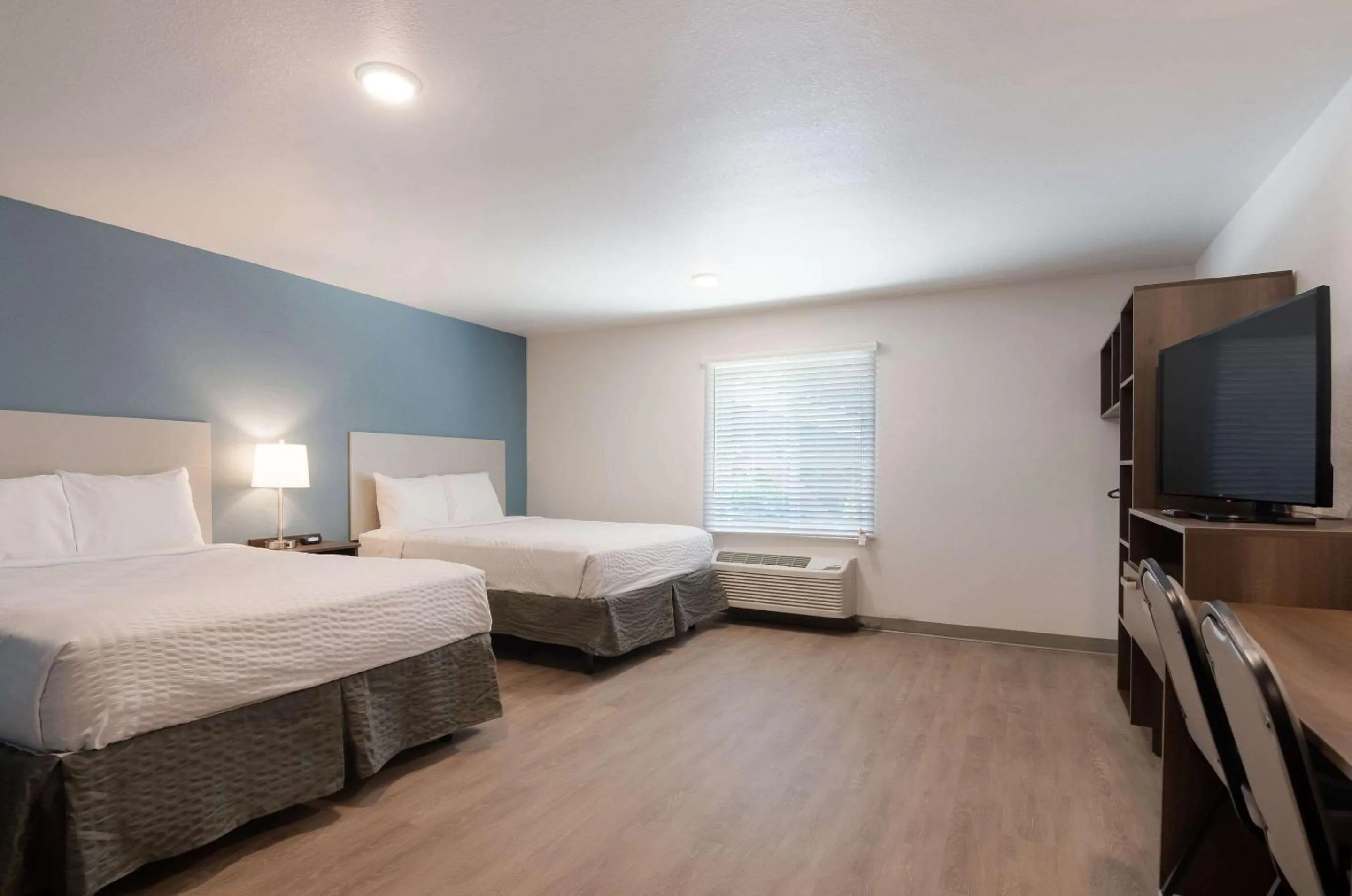 Bedroom, Bed in WoodSpring Suites Lynchburg VA