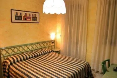 Photo of the whole room, Bed in Hotel Blue Rose's