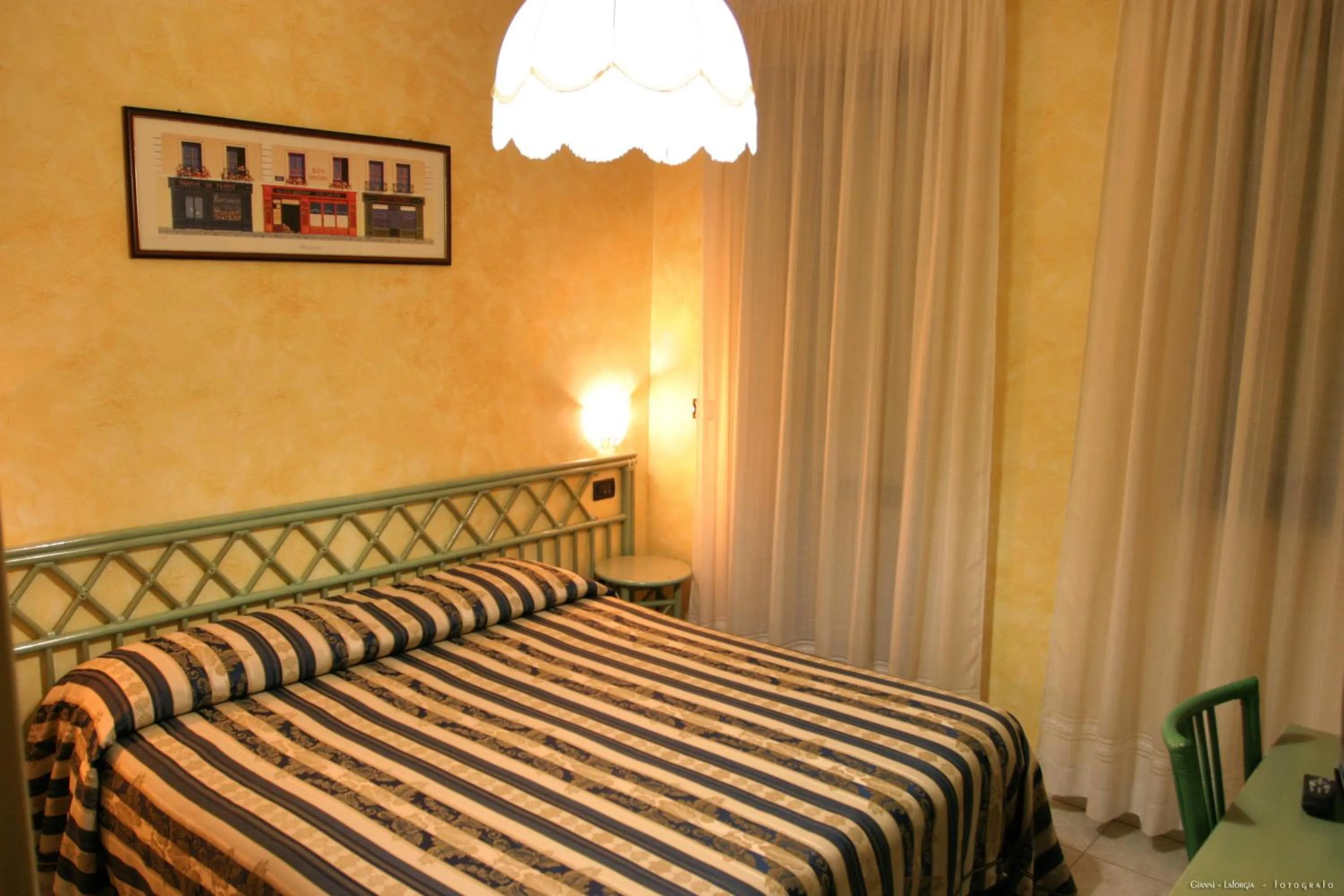 Bed in Hotel Blue Rose's