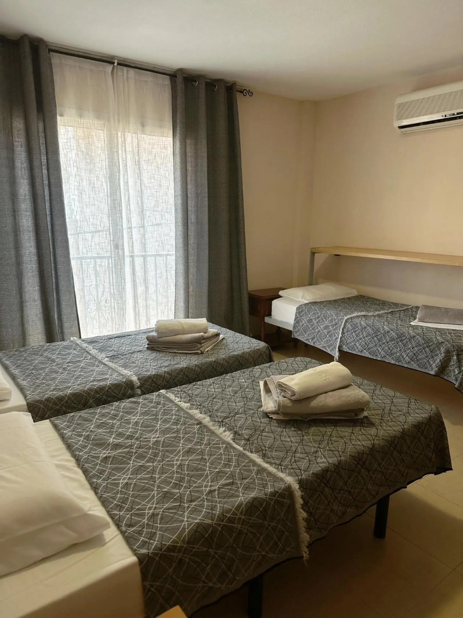 Bed in Royal Inn Aparthotel