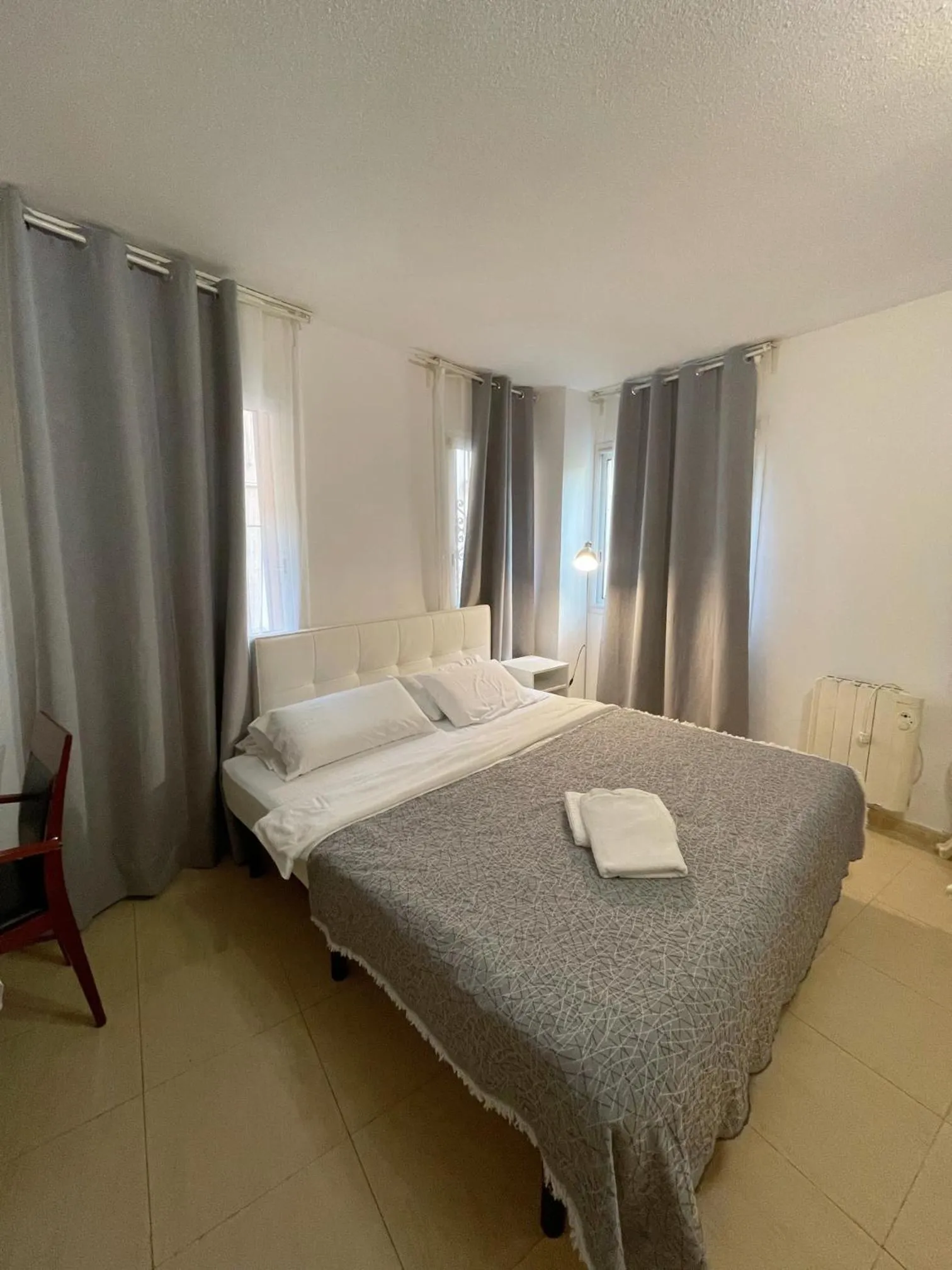 Bed in Royal Inn Aparthotel