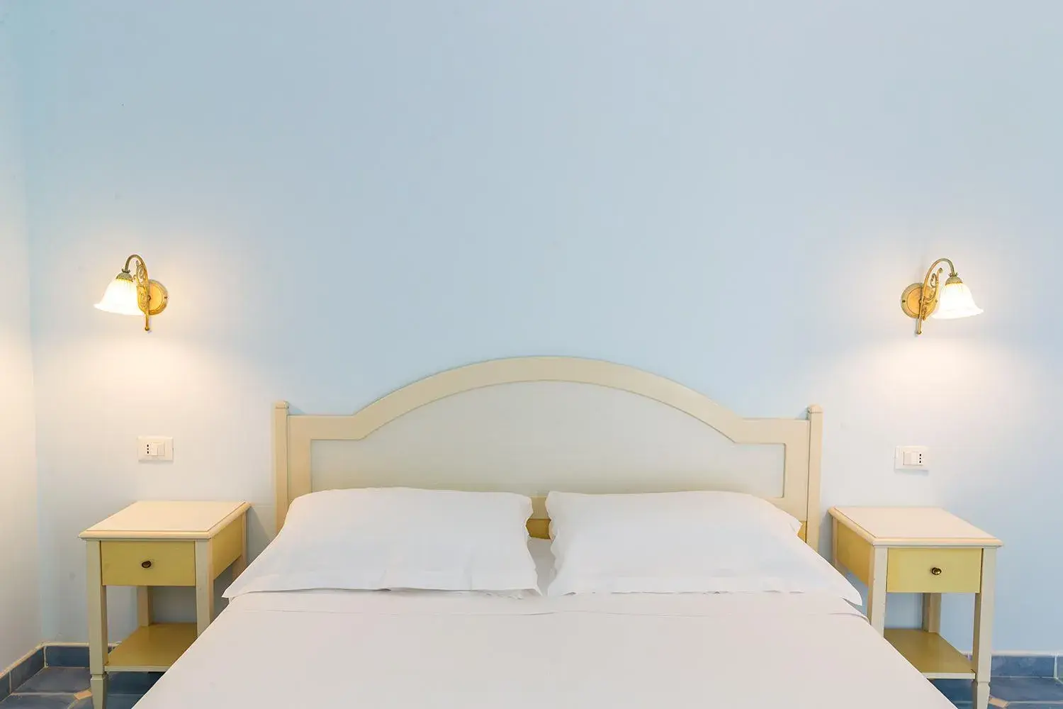 Bed in Baia dei Mulini Resort & Spa Bed in Baia dei Mulini Resort & Spa