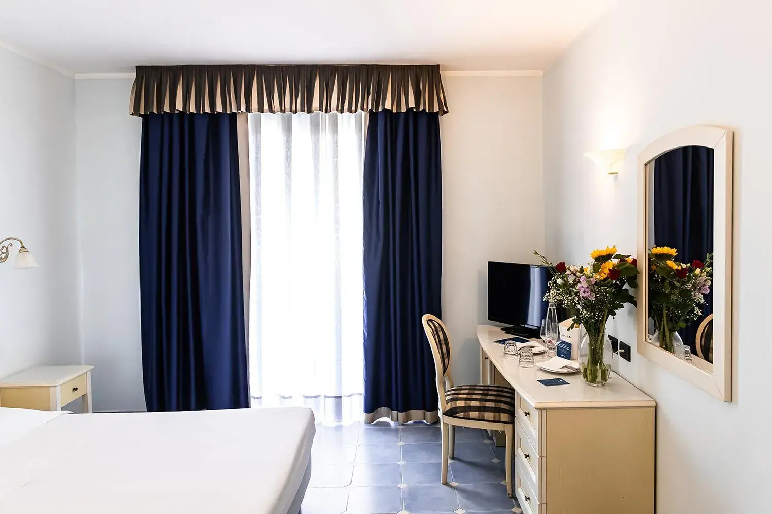 Bed in Baia dei Mulini Resort & Spa Bed in Baia dei Mulini Resort & Spa