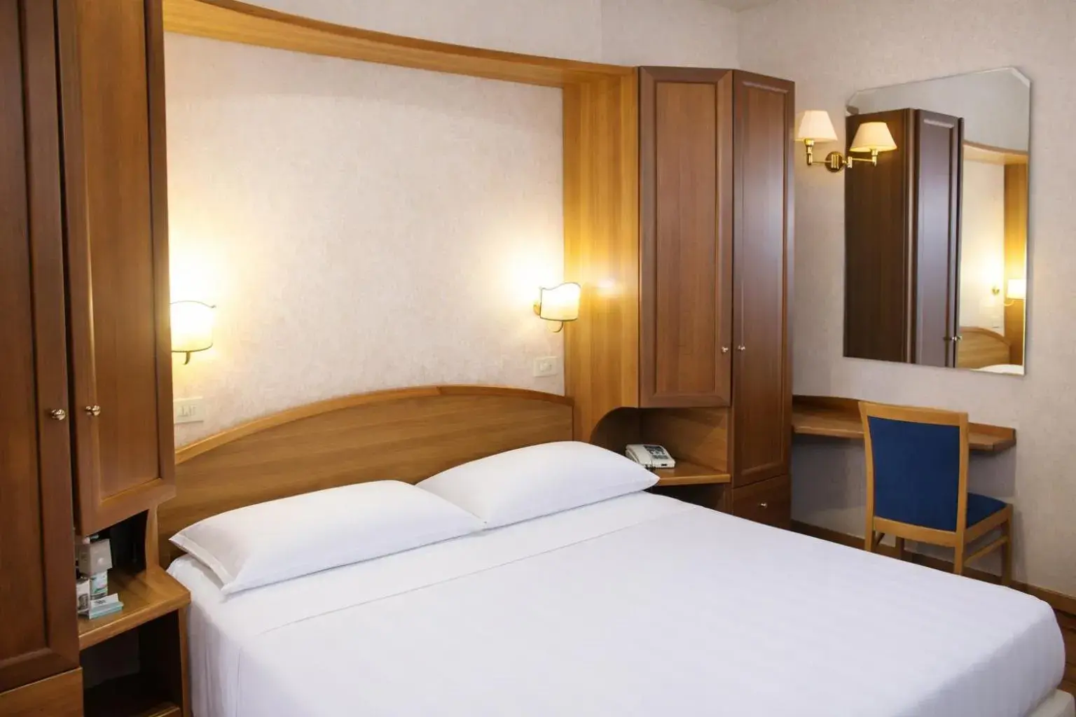 wardrobe, Bed in Phi Hotel Ambra wardrobe, Bed in Phi Hotel Ambra