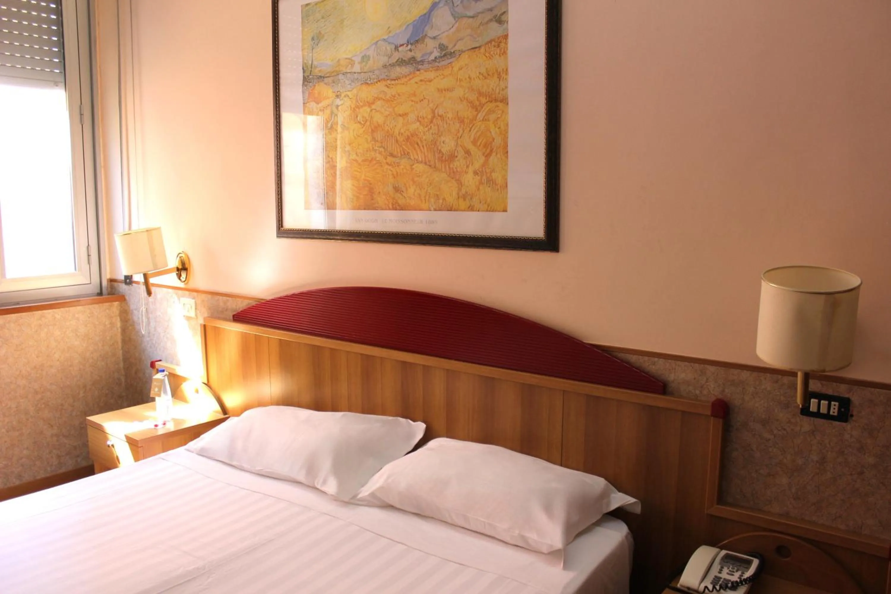 Bed in Phi Hotel Ambra