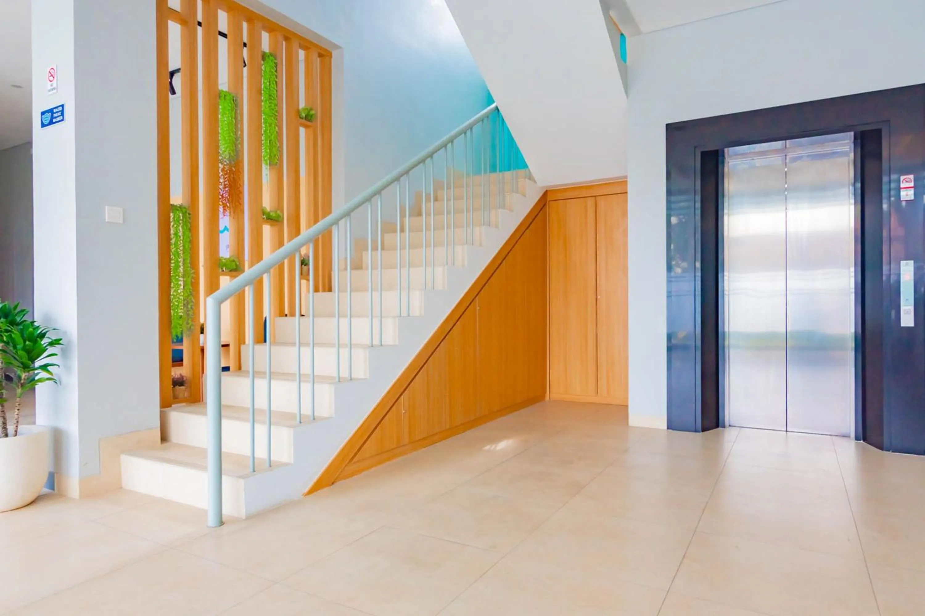 elevator in Sans Hotel Alexander Bandung