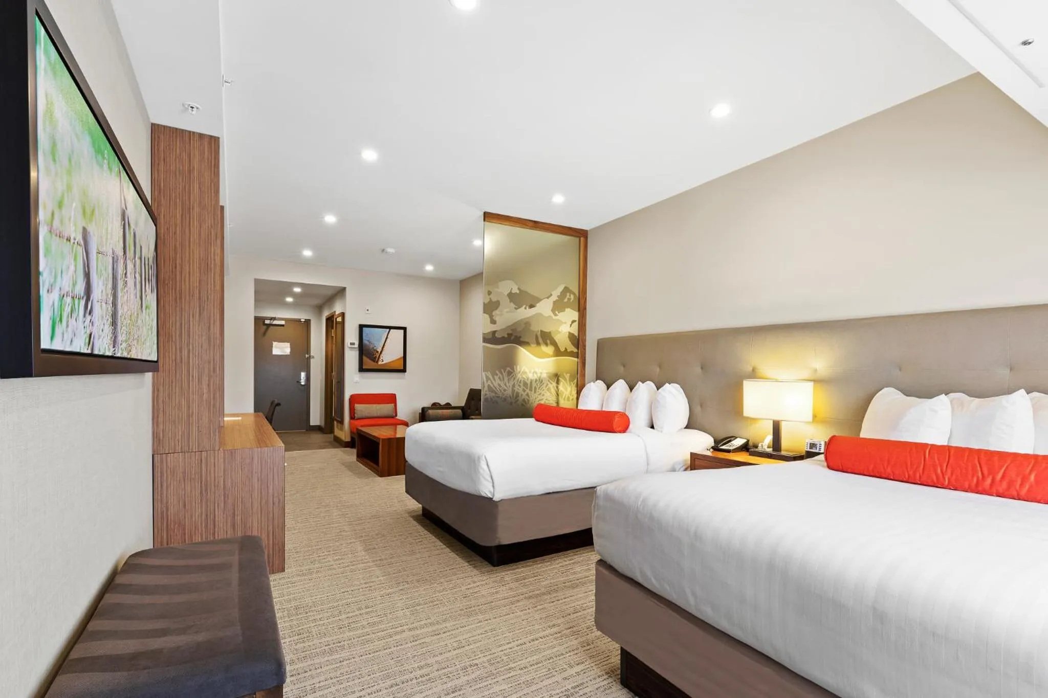 Bed in Mountain View Inn & Suites