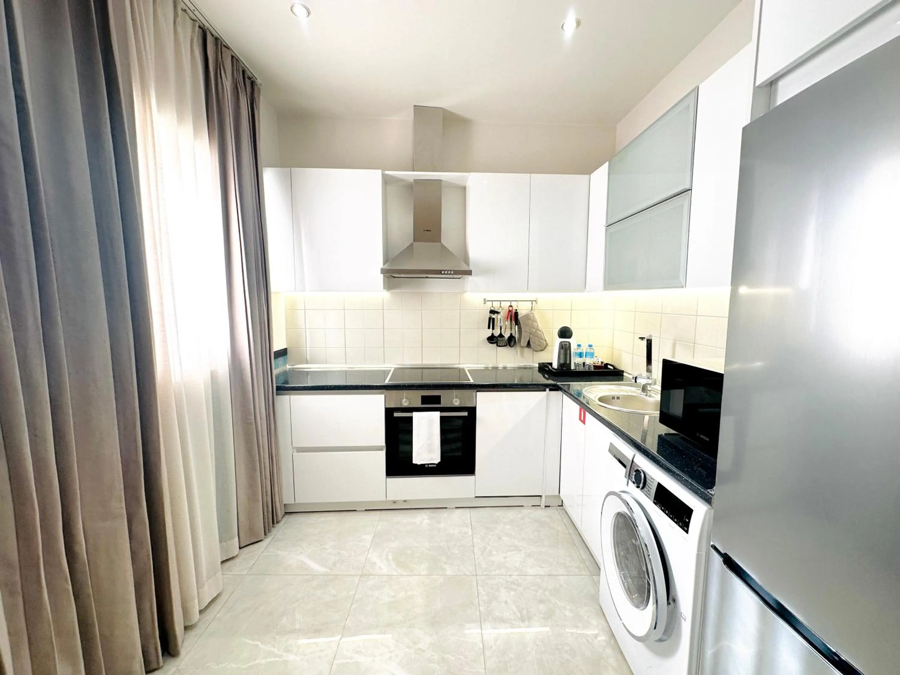 Kitchen or kitchenette in Somerset City Centre Atyrau