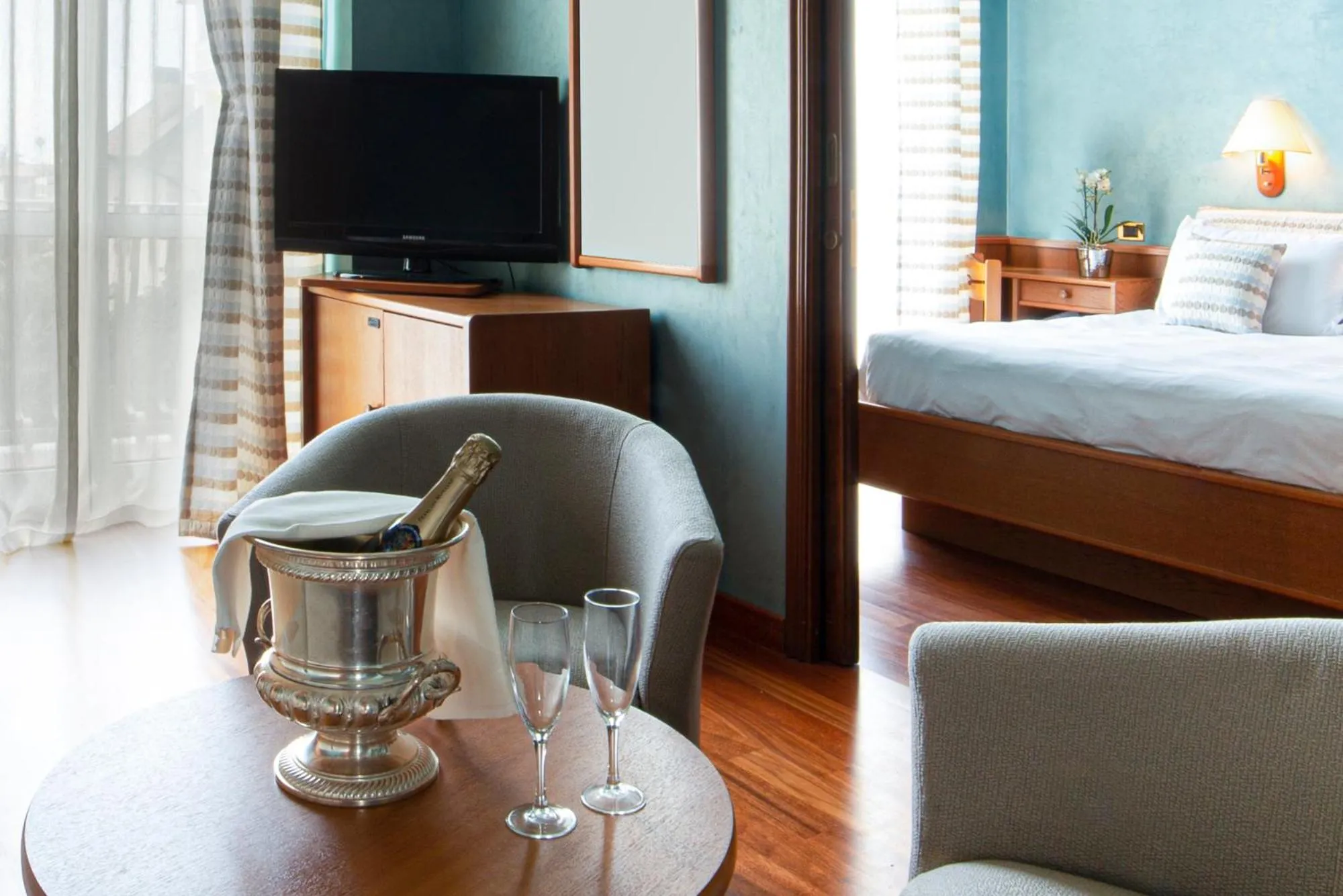 Living room, Bed in Hotel Villa Elisa & Spa