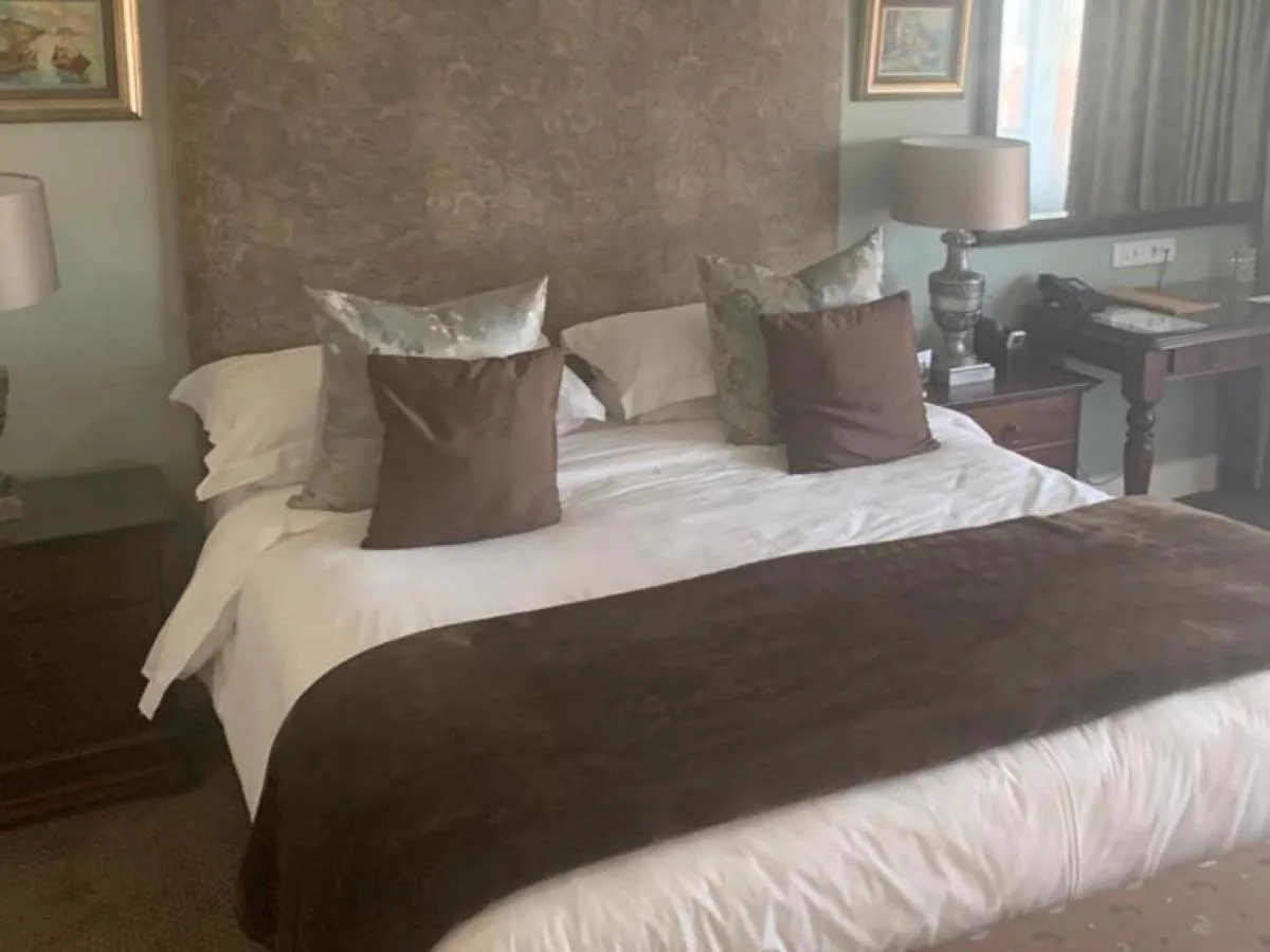 Bed in 131 on Herbert Baker Boutique Hotel