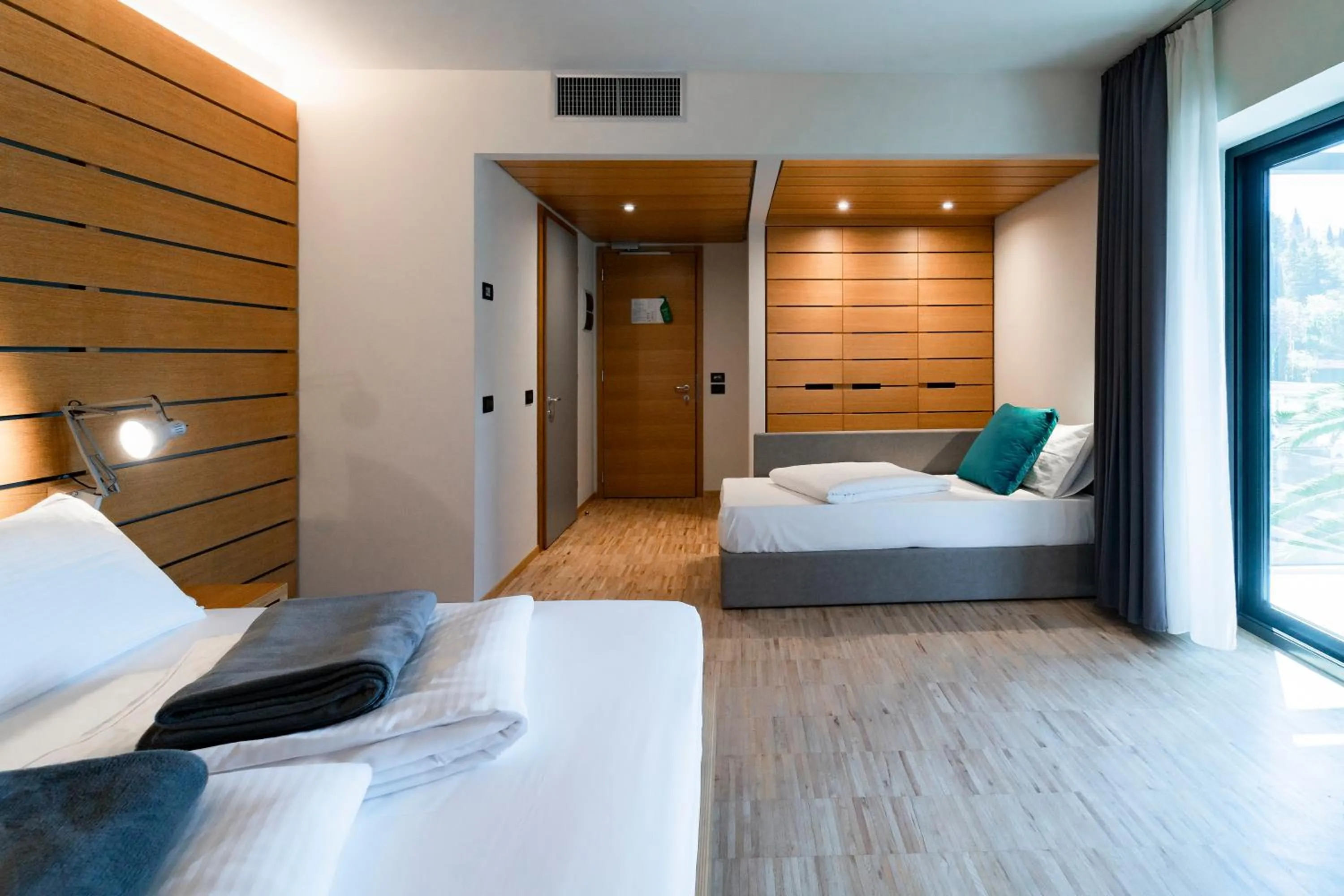 Bed in Lake Front Hotel Mirage