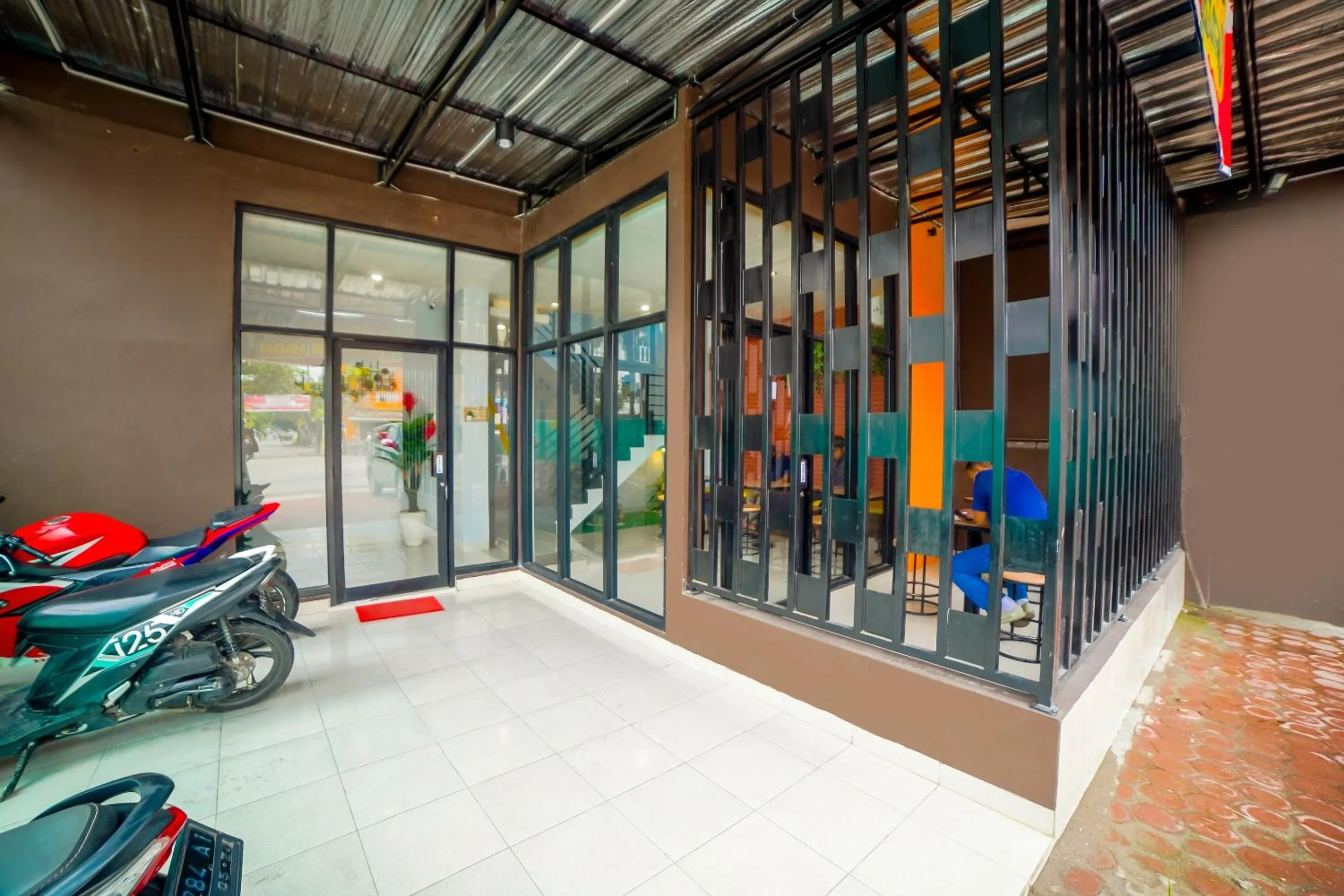 Facade/entrance in Capital O 90874 Millenium Inn 2