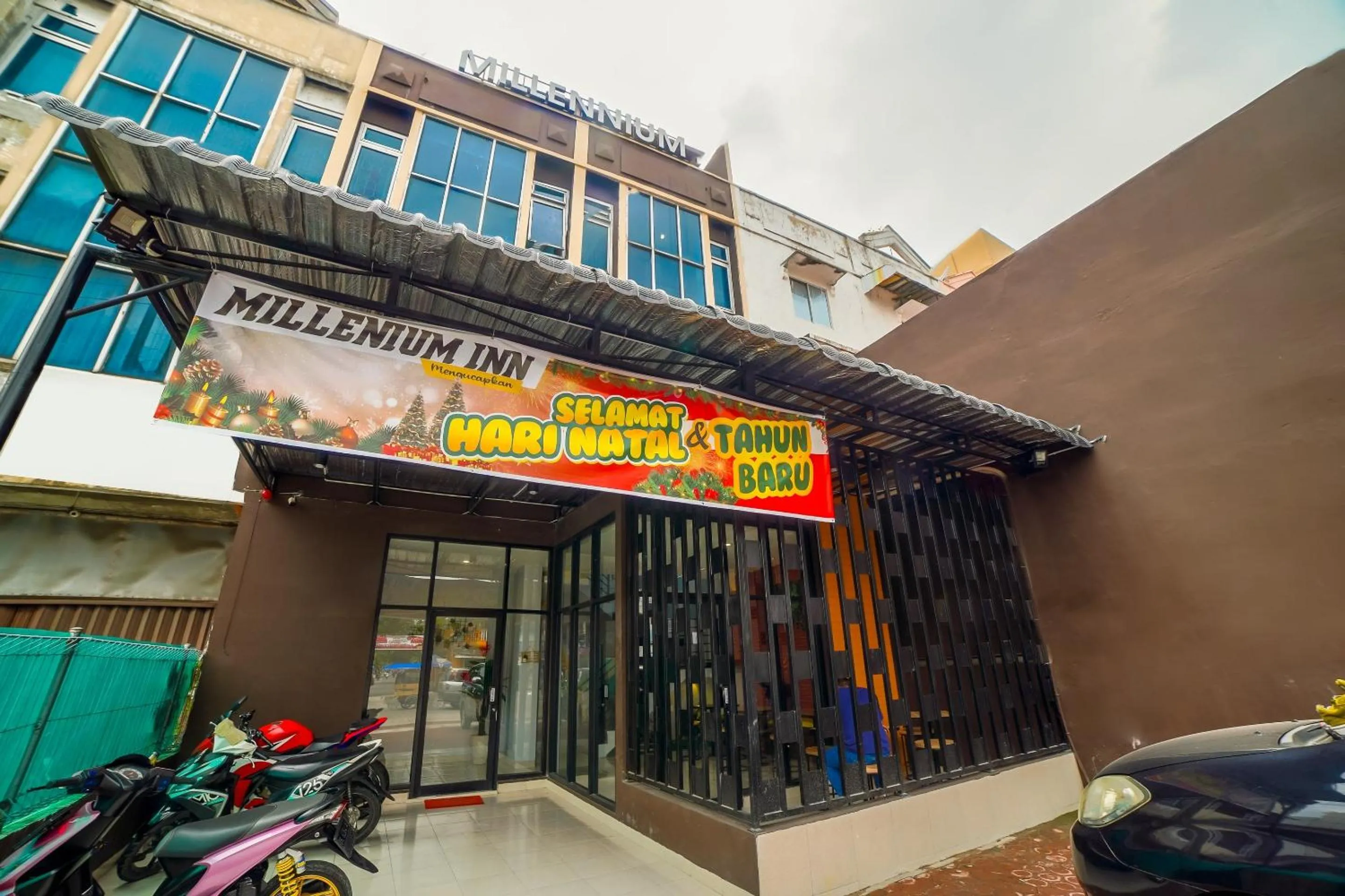 Facade/entrance in Capital O 90874 Millenium Inn 2