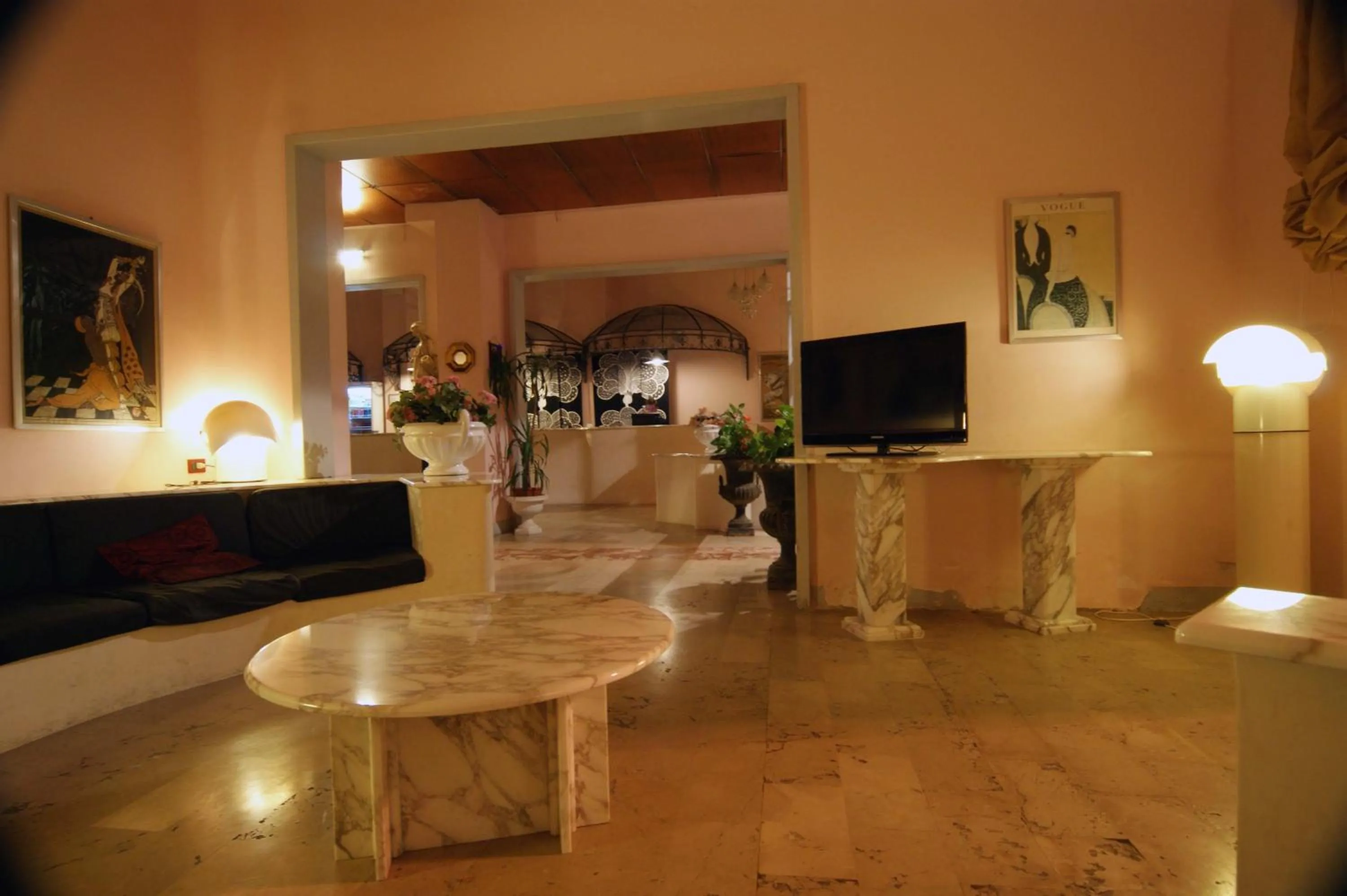 Communal lounge/ TV room in Hotel Liberty