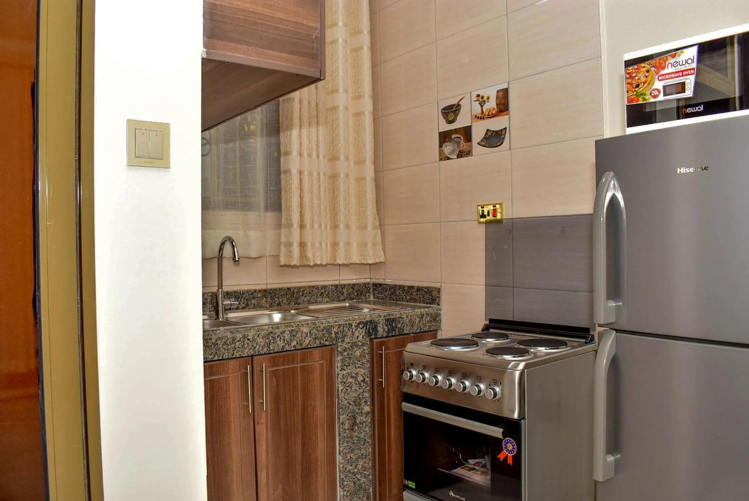 Kitchen or kitchenette in Studio - Sleeps 2 - Free Airport Pickup