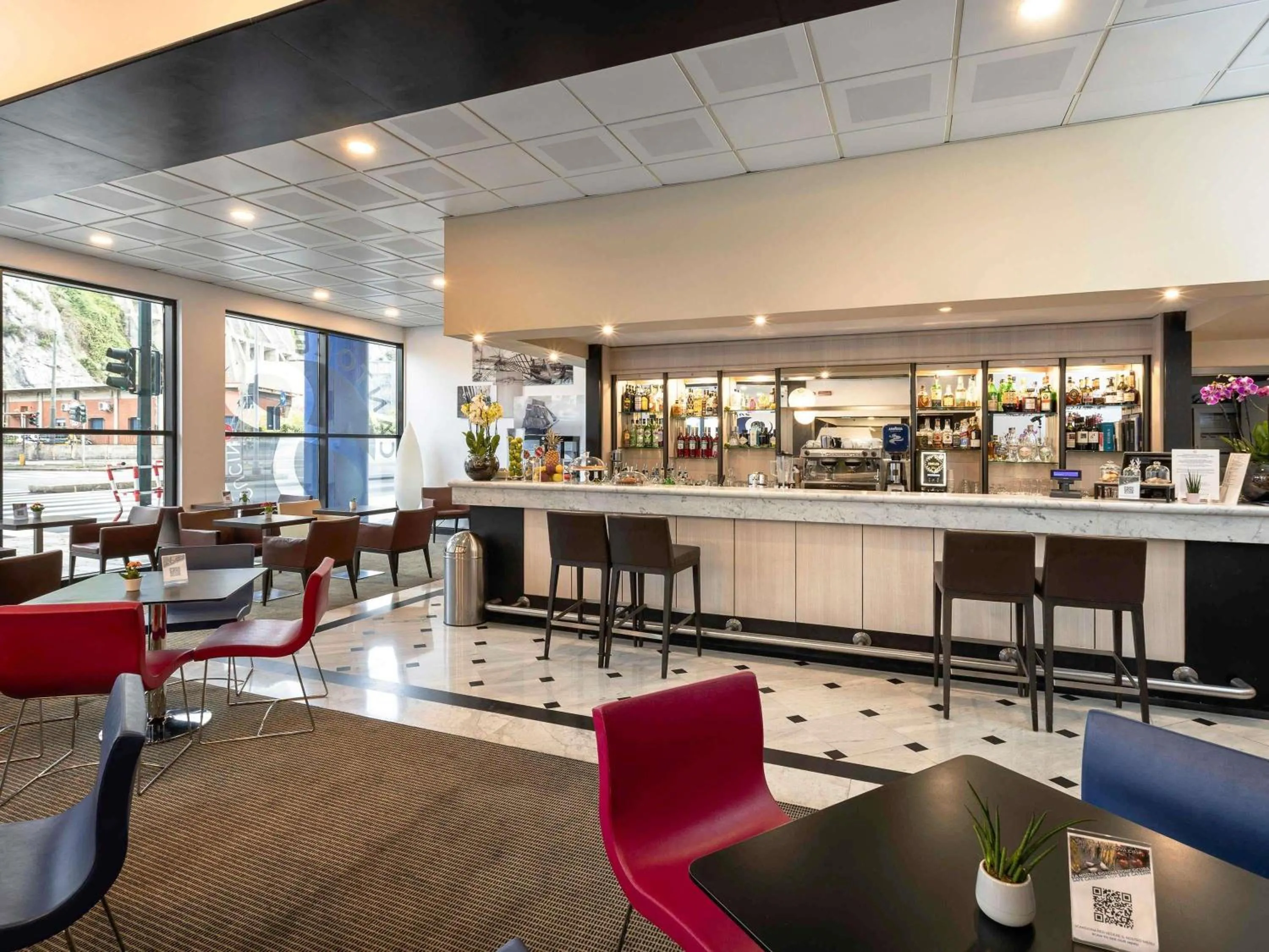 Lounge or bar in Novotel Genova City