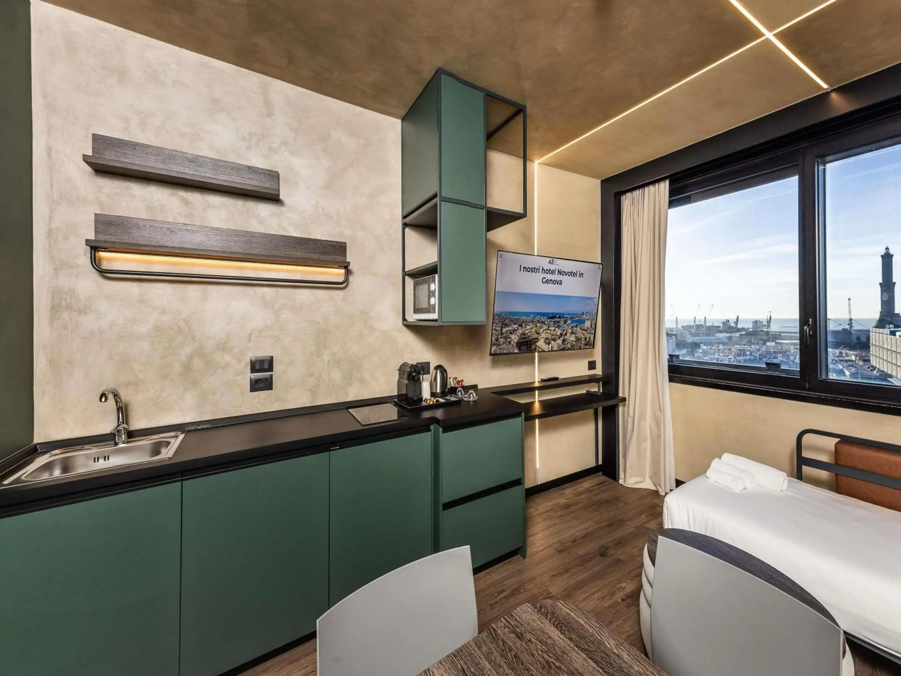 Bedroom in Novotel Genova City Bedroom in Novotel Genova City