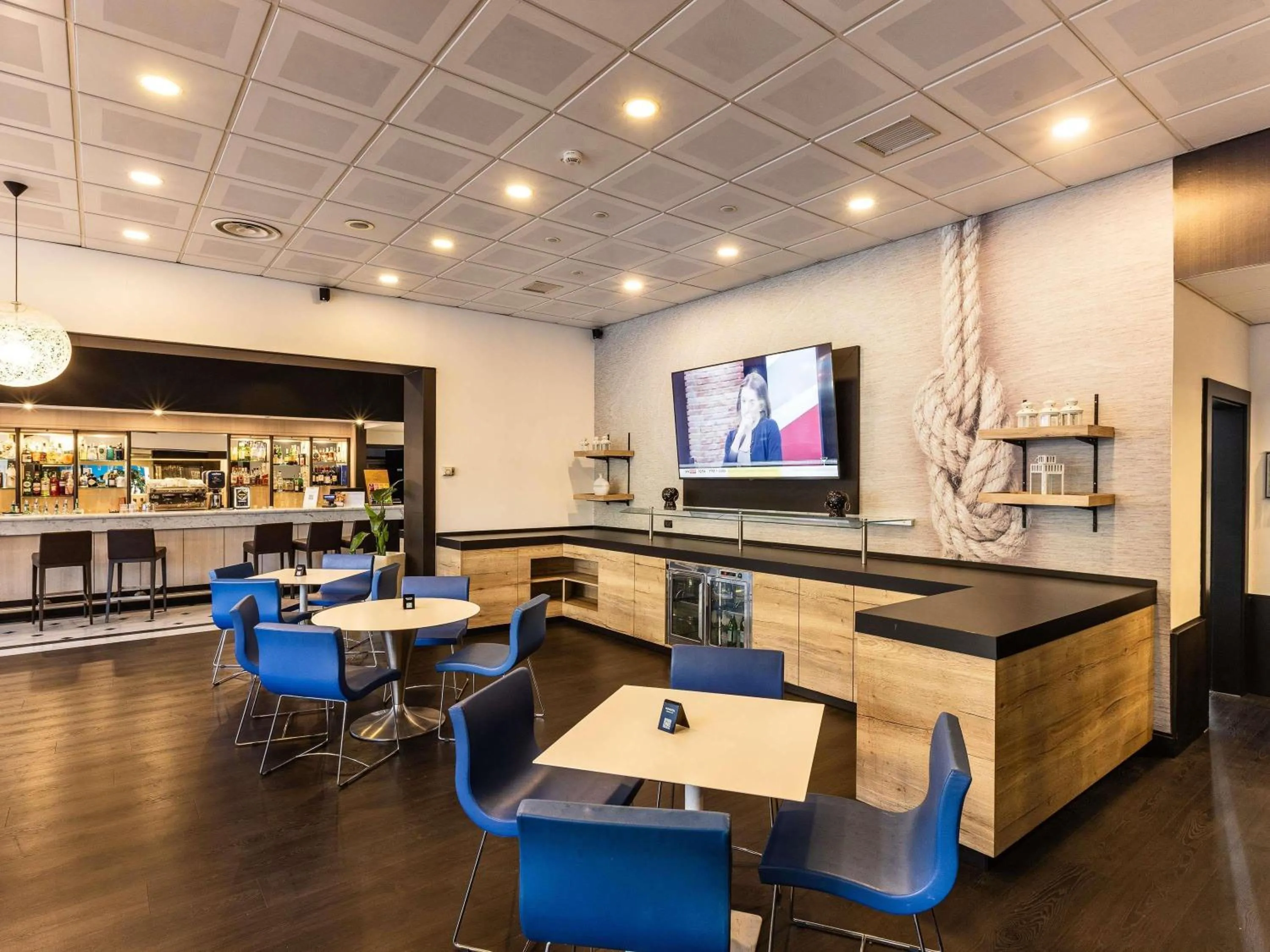 Lounge or bar in Novotel Genova City