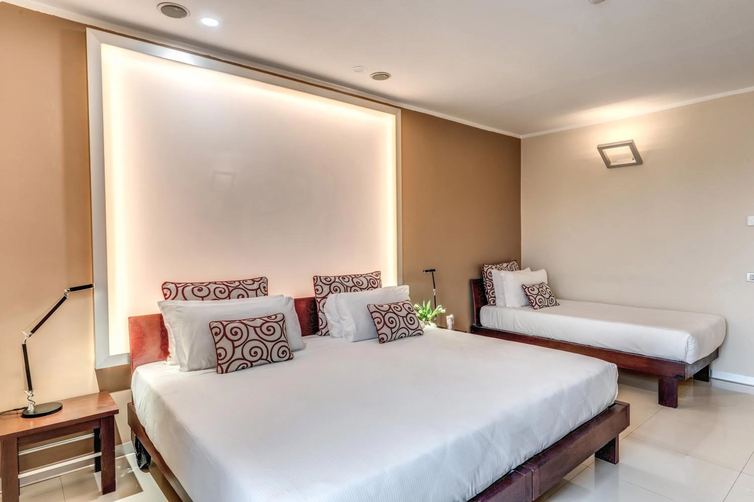 Bed in La Griffe Hotel Roma