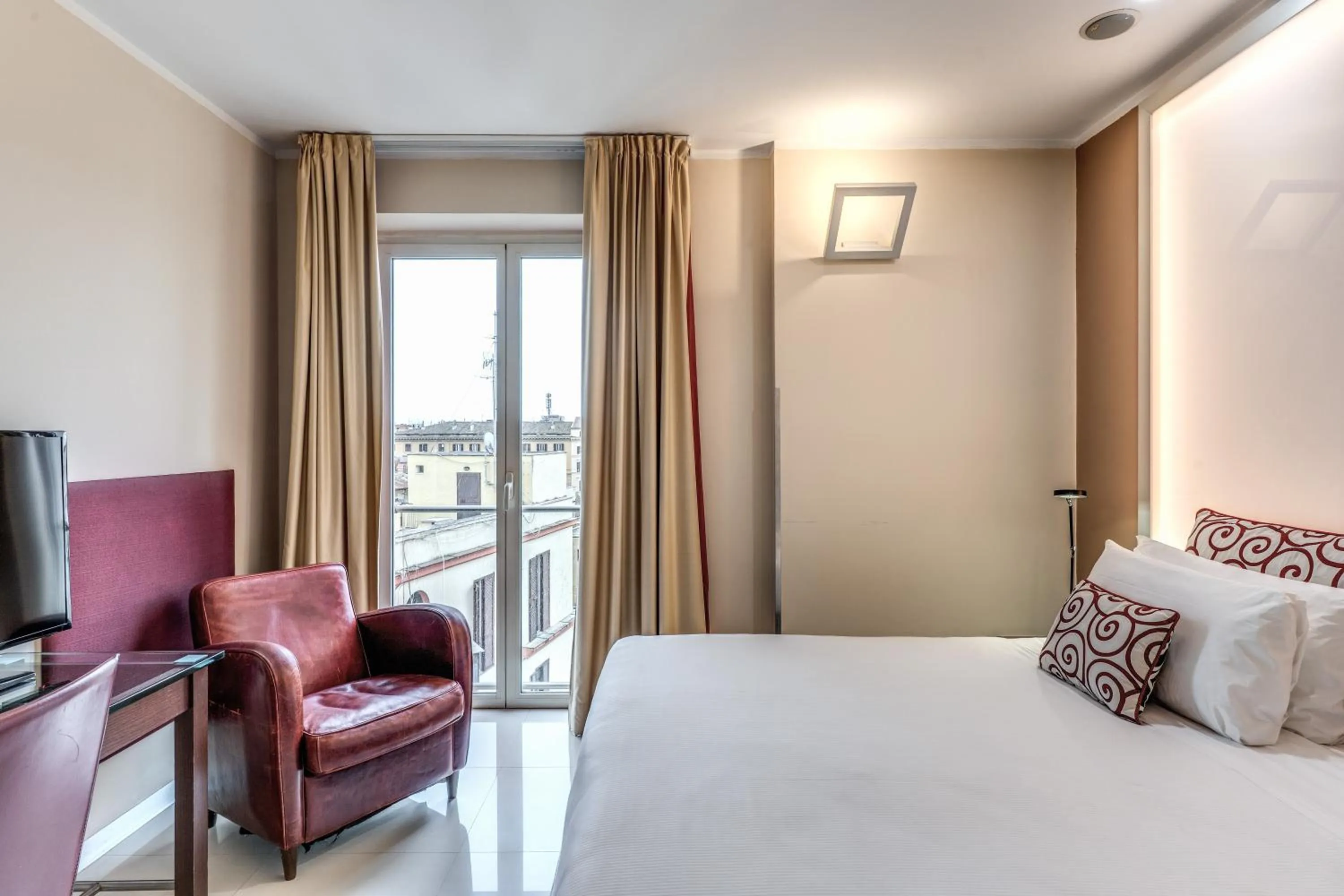 Bed in La Griffe Hotel Roma