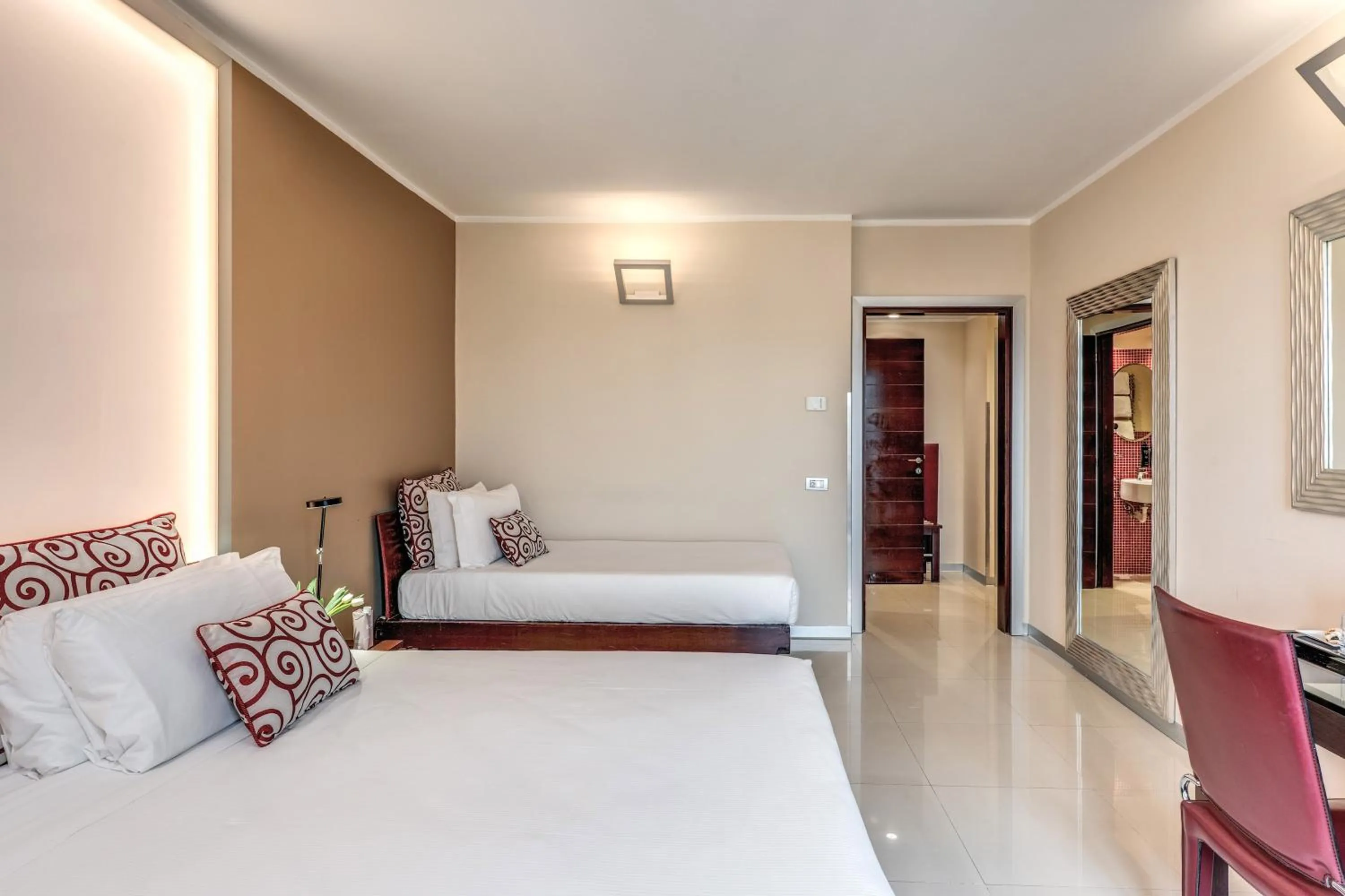 Bed in La Griffe Hotel Roma