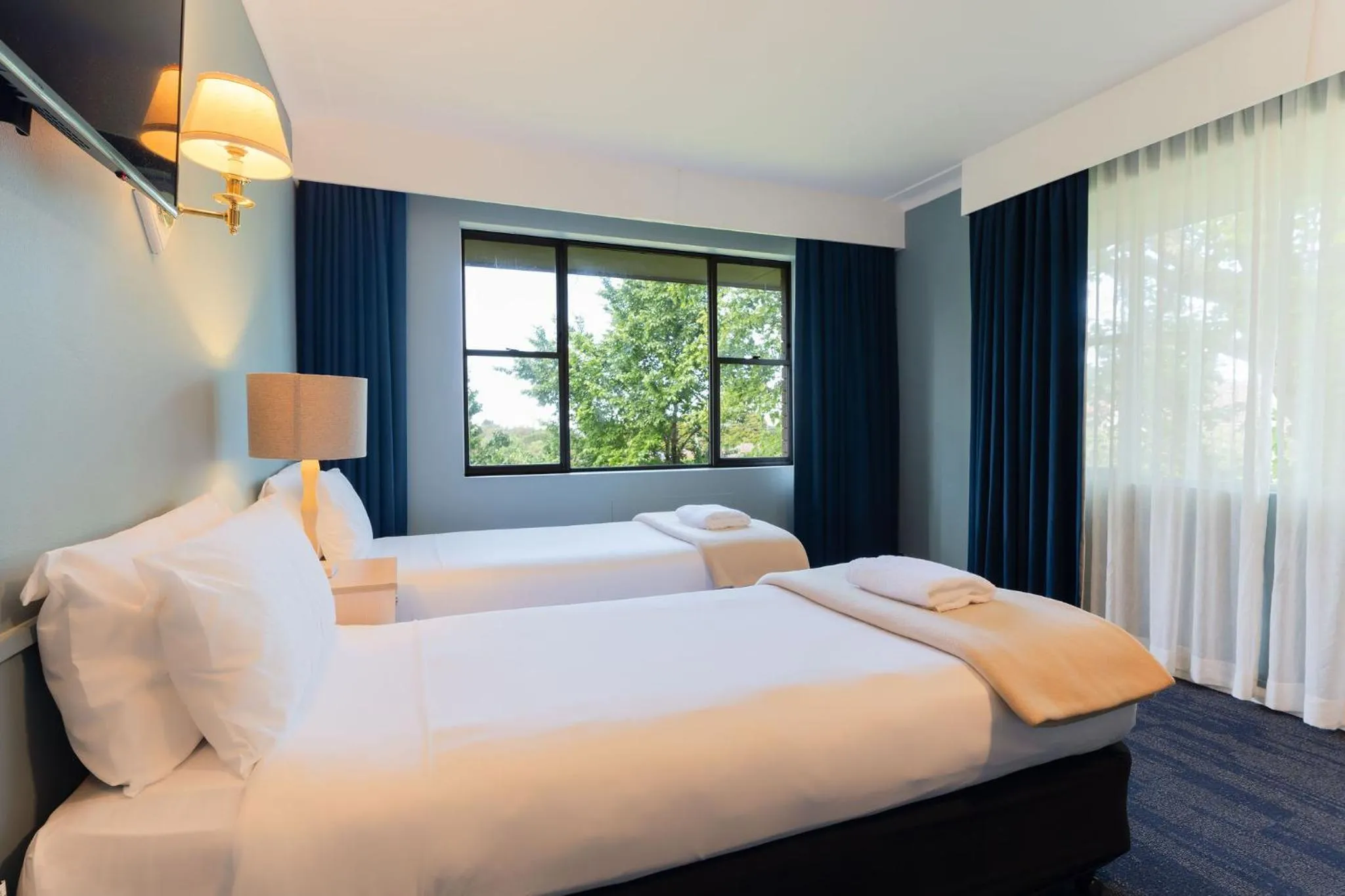 Bed in Leura Gardens Resort