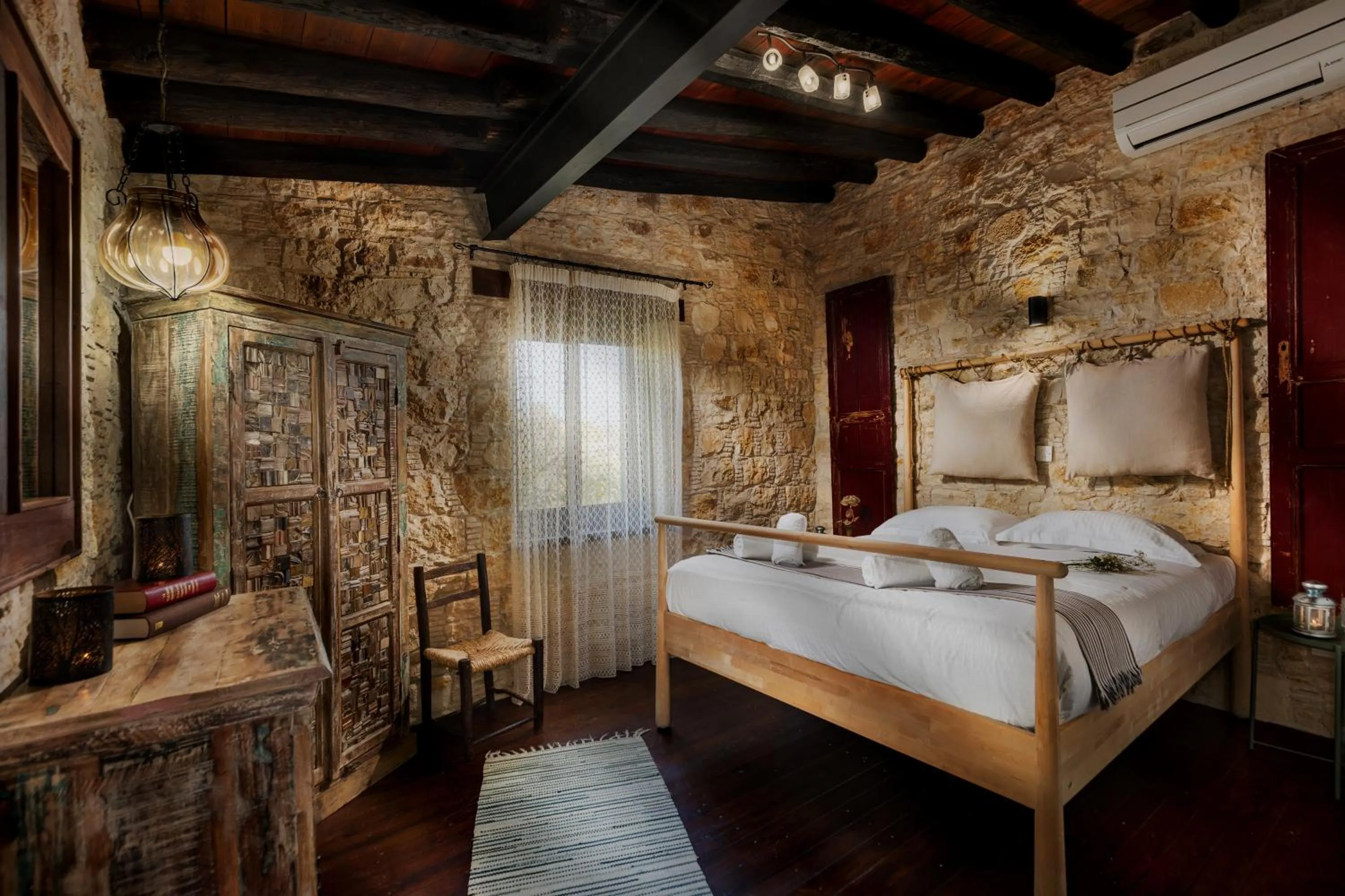 Bed in Oinoessa Traditional Boutique Guest Houses