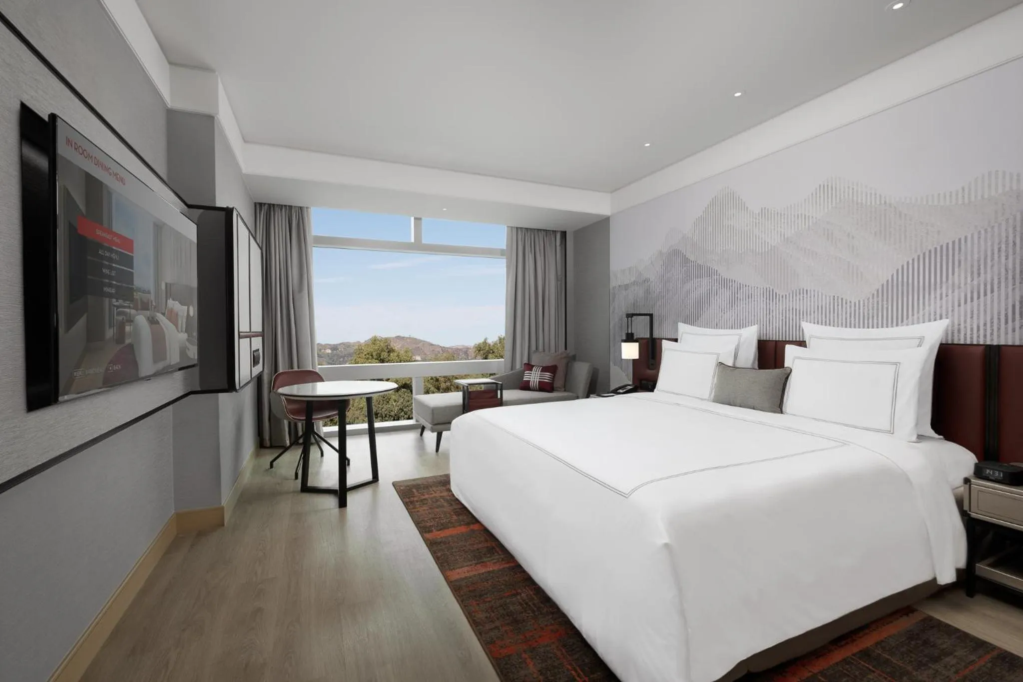 Photo of the whole room, Bed in Swissôtel Clark Philippines