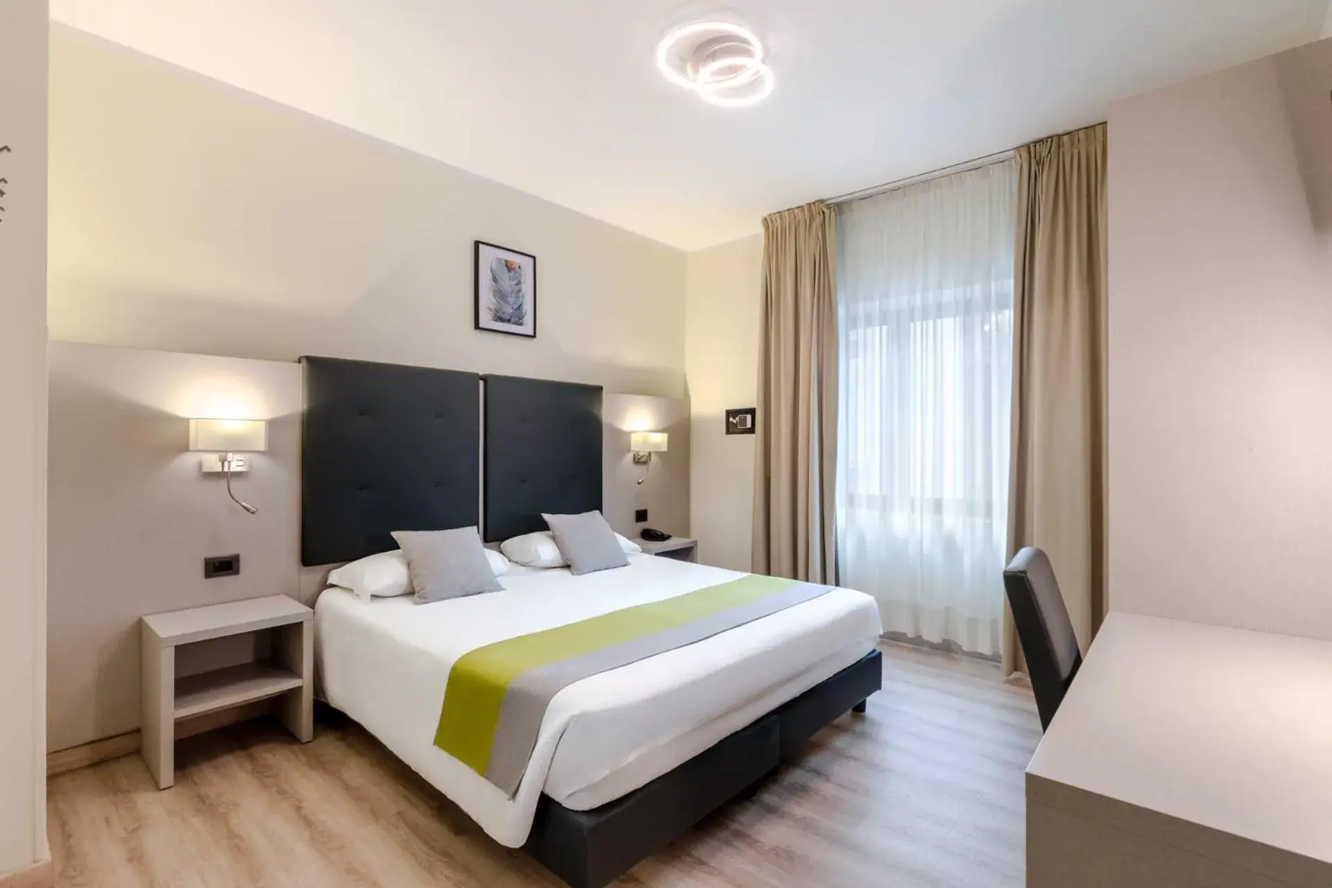 Bed in Hotel Aurora Bed in Hotel Aurora