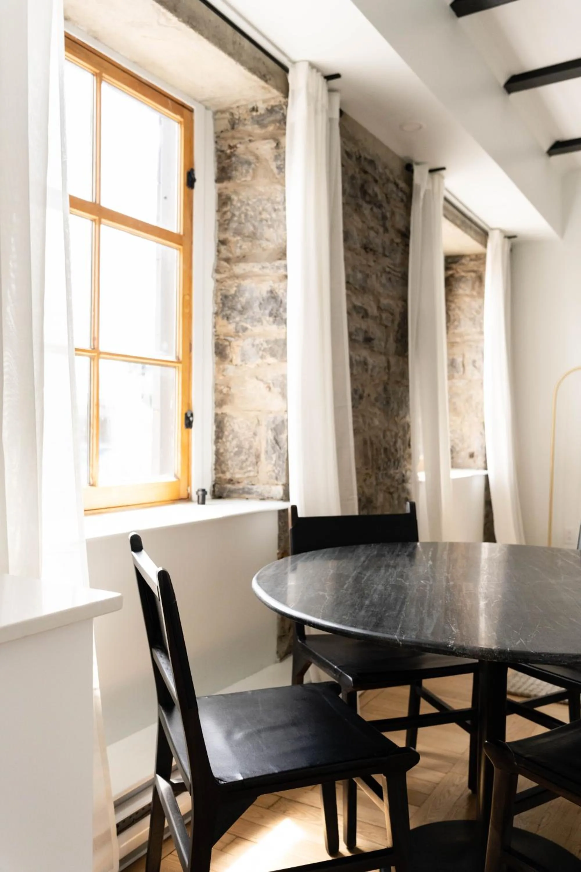 Dining area in Maison Rasco by Luxury In Transit