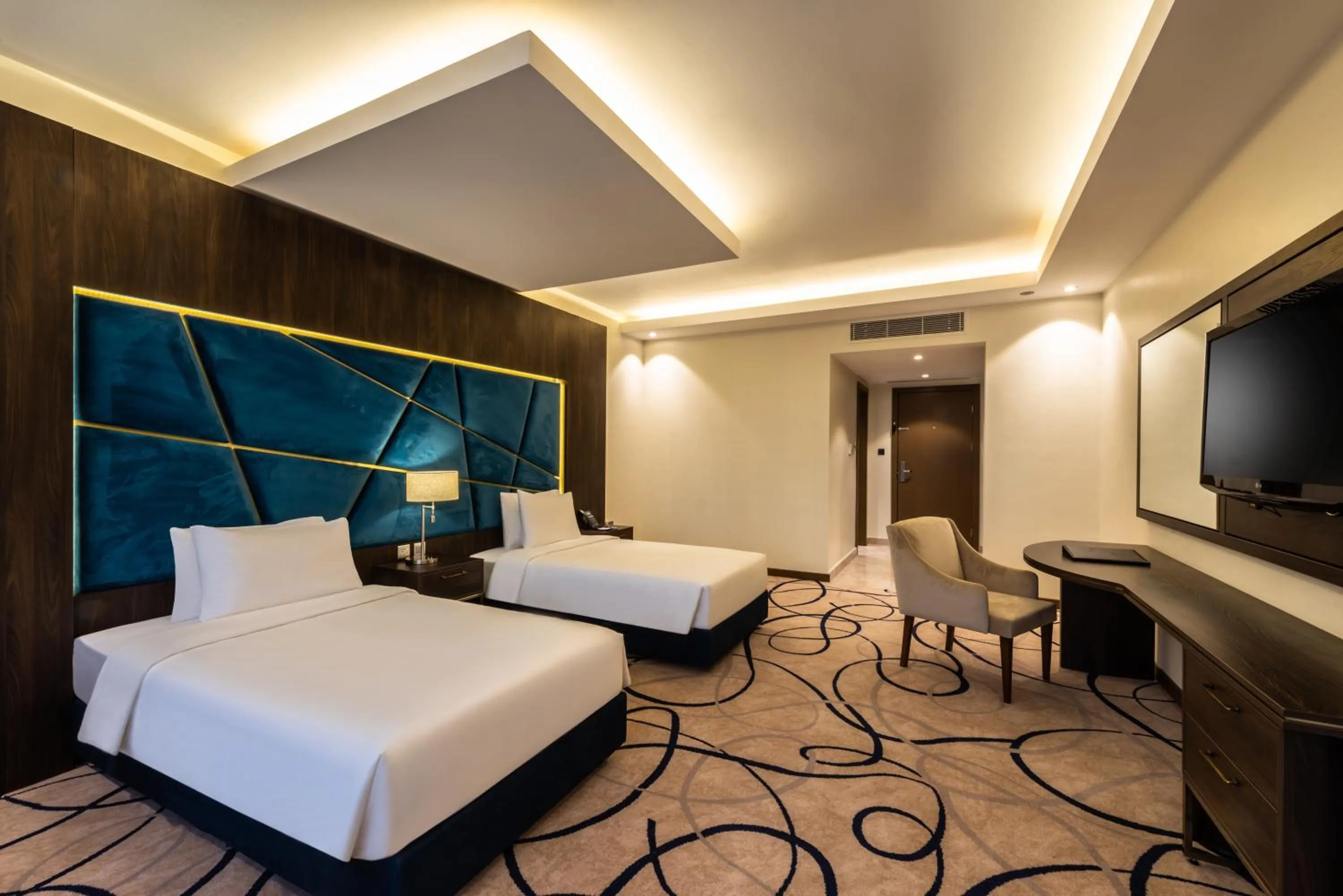 Living room, Bed in Warwick Riyadh Al Wezarat