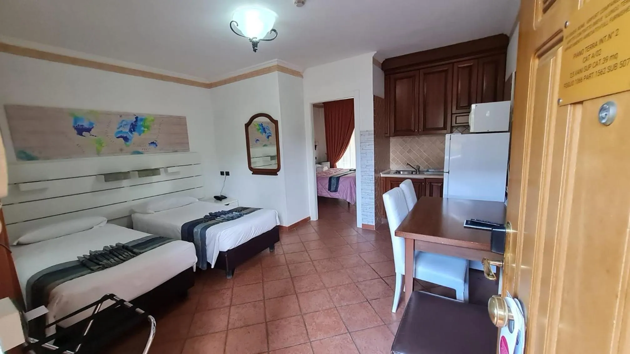 Kitchen or kitchenette, Bed in EURO HOUSE INN airport