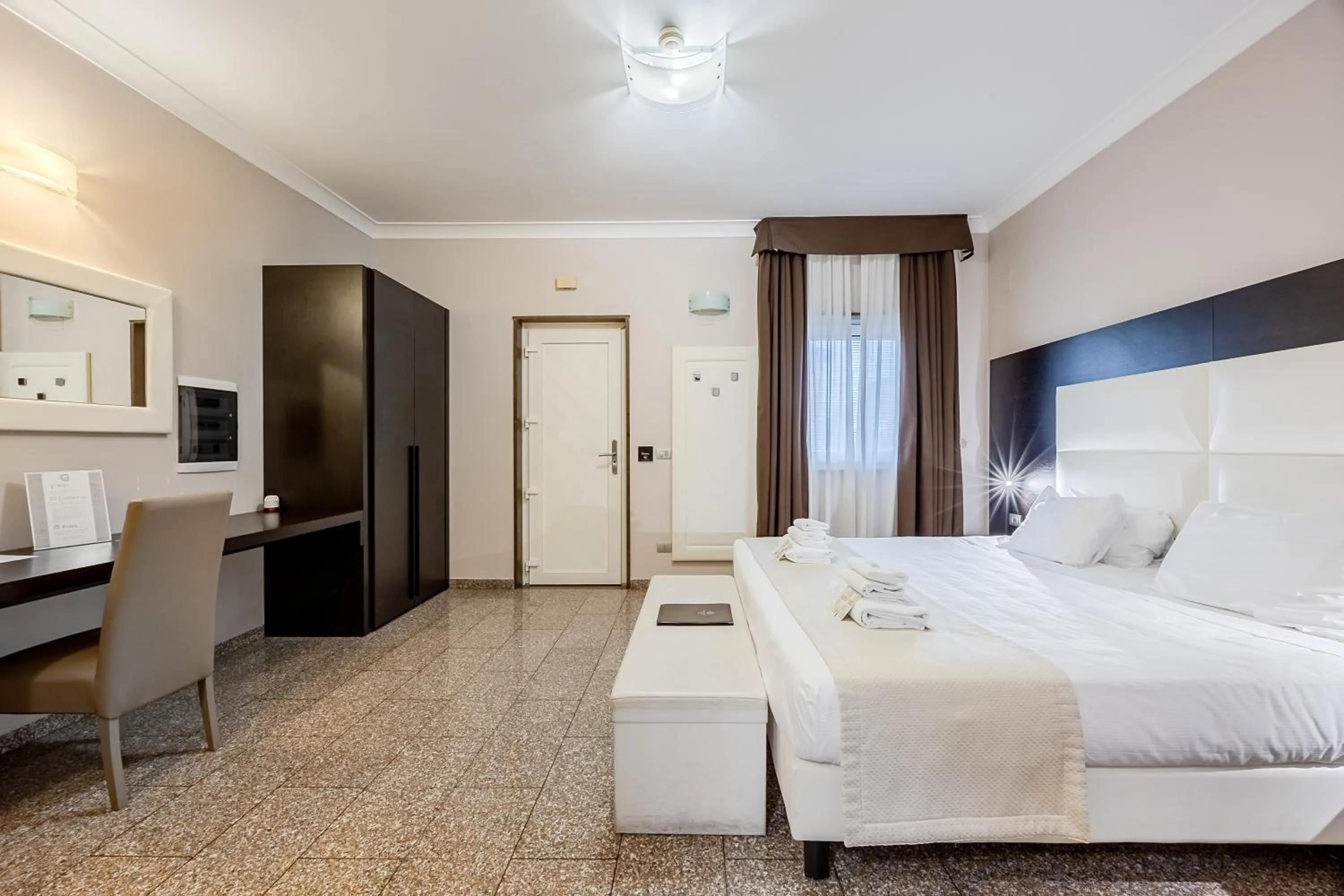 Photo of the whole room, Bed in EH Suites Rome Airport Euro House Hotels