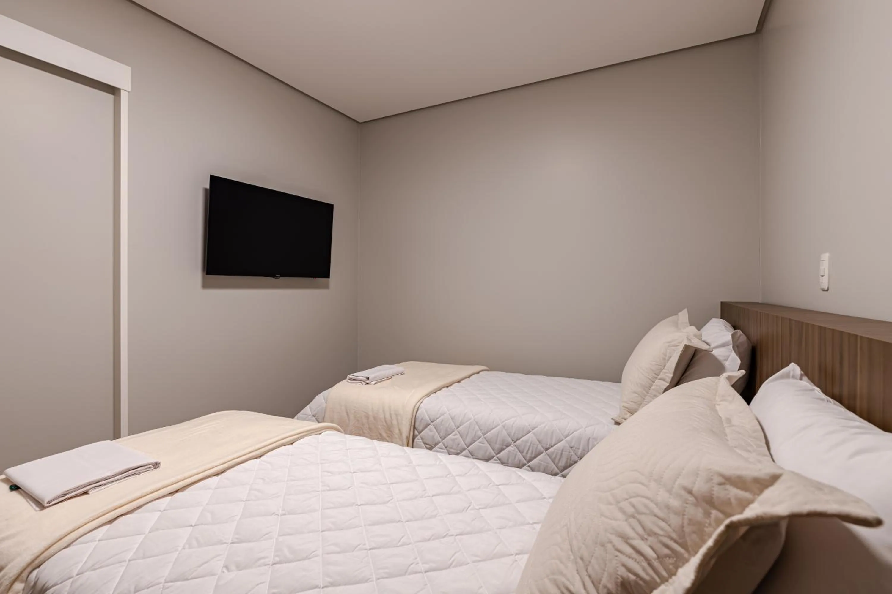 Bed in Pousada Serra Verde