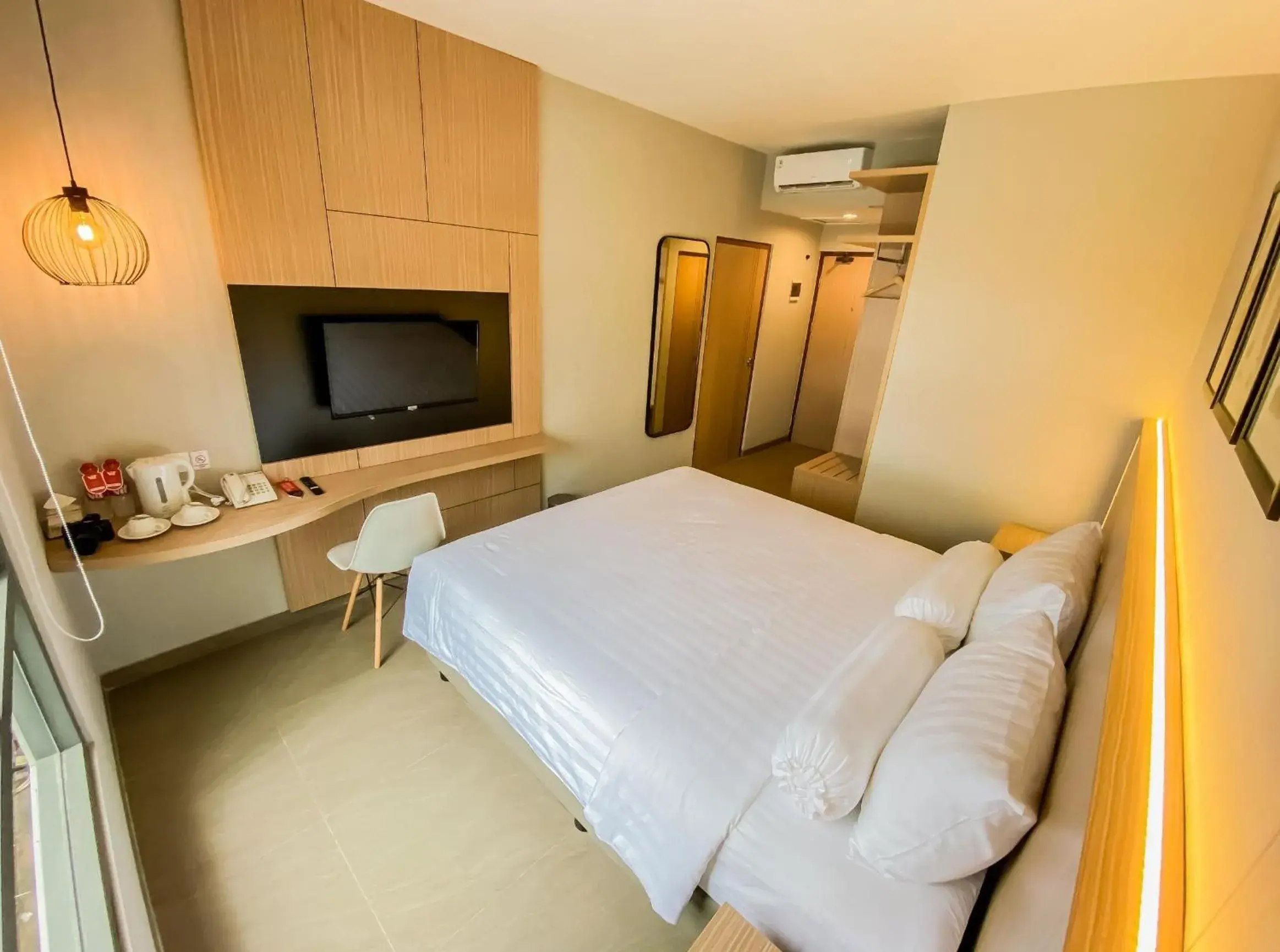 Bed in Front One King Hotel Tuban Bed in Front One King Hotel Tuban